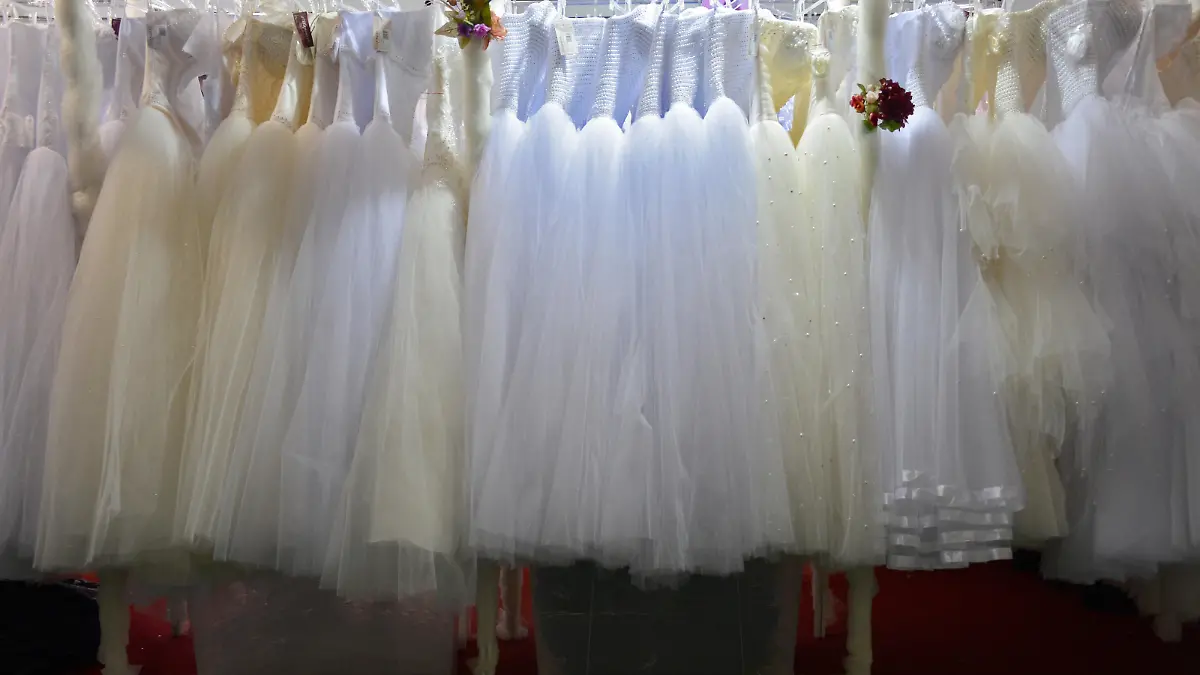 2266306 Russia, Moscow. 08/17/2013 Wedding dresses displayed at the 23 International Wedding Fashion Moscow trade show of wedding and evening wear and accessories, held in the All-Russia Exhibition Center. Ekaterina Chesnokova/RIA Novosti
