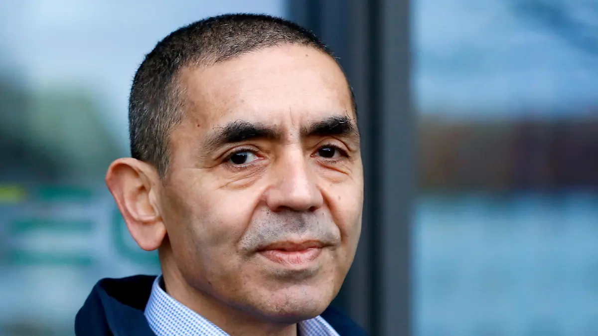 FILE PHOTO: CEO and co-founder of BioNTech, Ugur Sahin, answers journalists' questions after the European Medicines Agency (EMA) approved its COVID-19 vaccine, at the company headquarters in Mainz, Germany December 22, 2020. REUTERS/Ralph Orlowski/File Photo