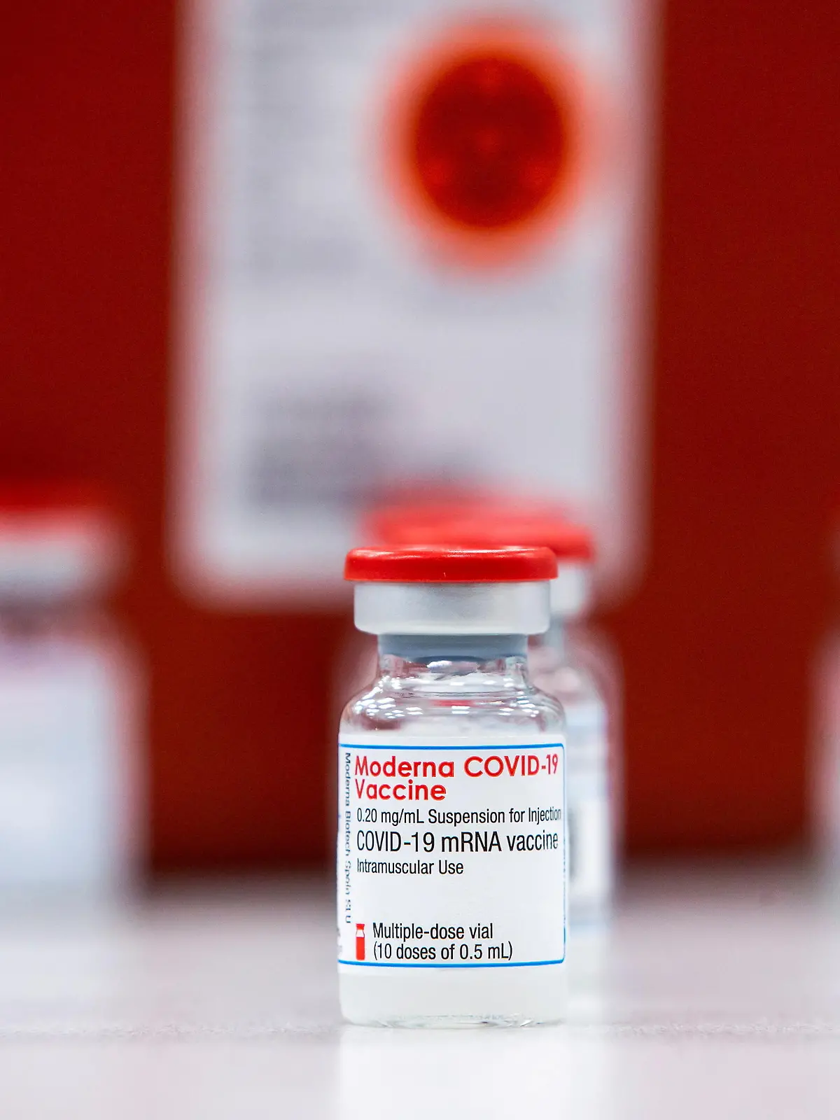 FILE PHOTO: Vials of the Moderna COVID-19 vaccine are seen at Apotex pharmaceutical company as Humber River Hospital's mobile vaccine clinic vaccinate employees as part of the coronavirus disease (COVID-19) vaccination campaign, in Toronto, Ontario, Canada April 13, 2021. REUTERS/Carlos Osorio/File Photo