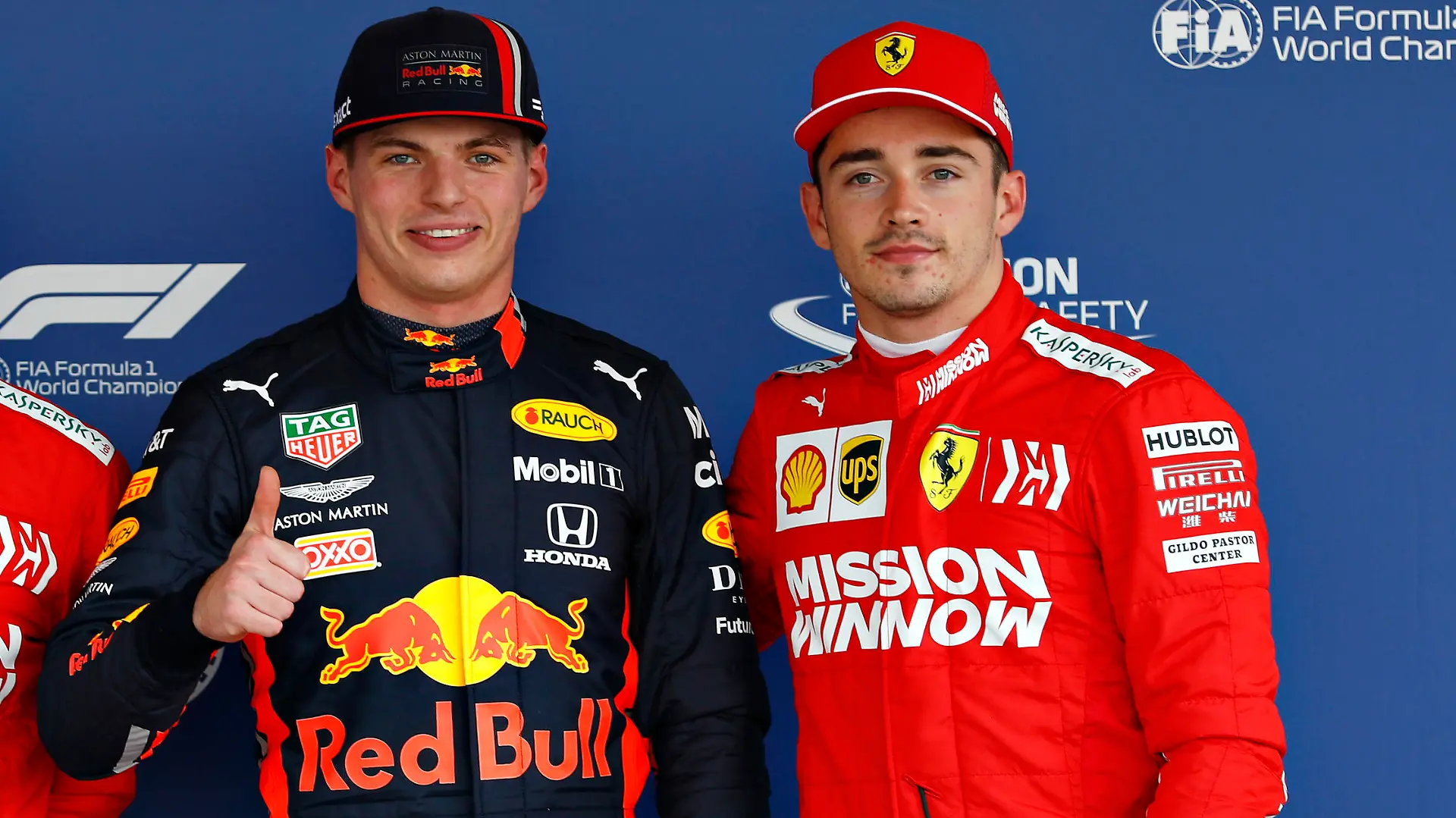 MEXICO CITY, MEXICO - OCTOBER 26: Top three qualifiers Max Verstappen of Netherlands and Red Bull Racing, Charles Leclerc of Monaco and Ferrari and Sebastian Vettel of Germany and Ferrari celebrate in parc ferme during qualifying for the F1 Grand Prix of Mexico at Autodromo Hermanos Rodriguez on October 26, 2019 in Mexico City, Mexico. (Photo by Will Taylor-Medhurst/Getty Images)