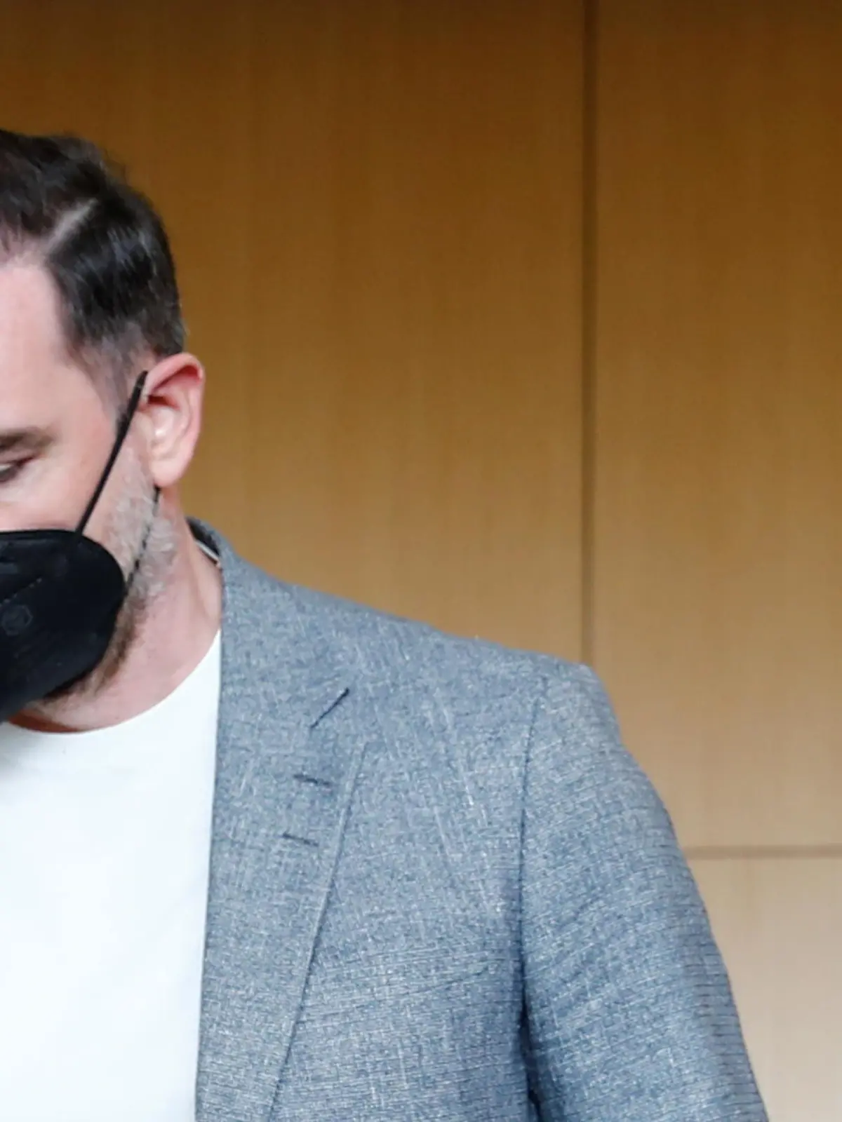 Former soccer player Christoph Metzelder looks down at the beginning of his trial, at a regional court in Duesseldorf, Germany, April 29, 2021.  REUTERS/Wolfgang Rattay/Pool