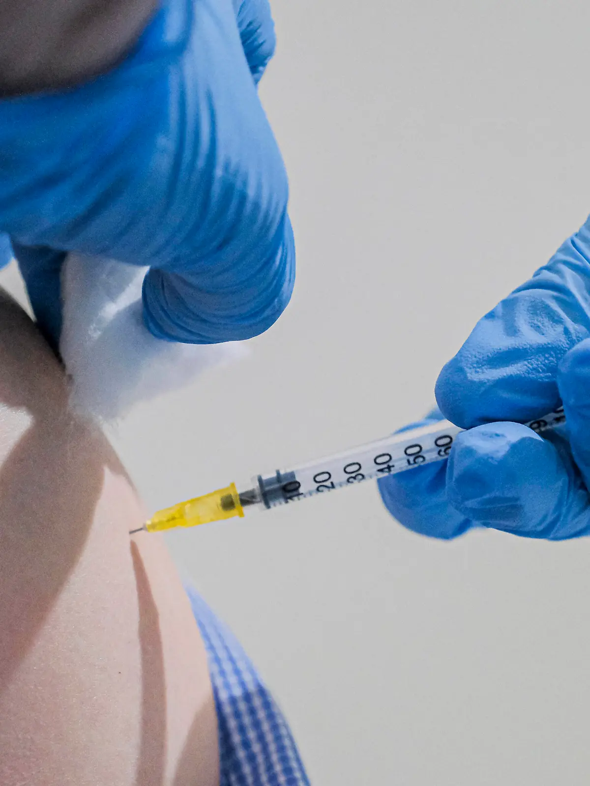 Italy: Vaccine Stazione Marittima Detail of the syringe containing the astrazeneca vaccine in naples on 20 march 2021, start of the vaccination campaign at the Stazione Marittima, a new vaccination point for the city of naples, after the EMA and AIFA stop with the Astrazeneca covid-19 vaccine File348 Copyright: xAntonioxBalascox 
