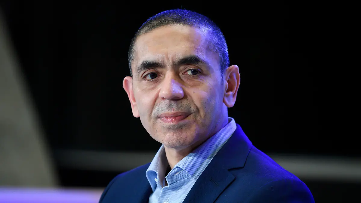 File - In this Thursday, March 18, 2021 file photo, Ugur Sahin, co-founder of the Mainz-based coronavirus vaccine developer BioNTech, listens during an Axel Springer Award ceremony. Europe can achieve 'herd immunity' against the coronavirus within the next four months, the head of German pharmaceutical company BioNTech, which developed the first widely approved COVID-19 vaccine with U.S. partner Pfizer, said Wednesday. (Bernd von Jutrczenka/dpa via AP, Pool, file)