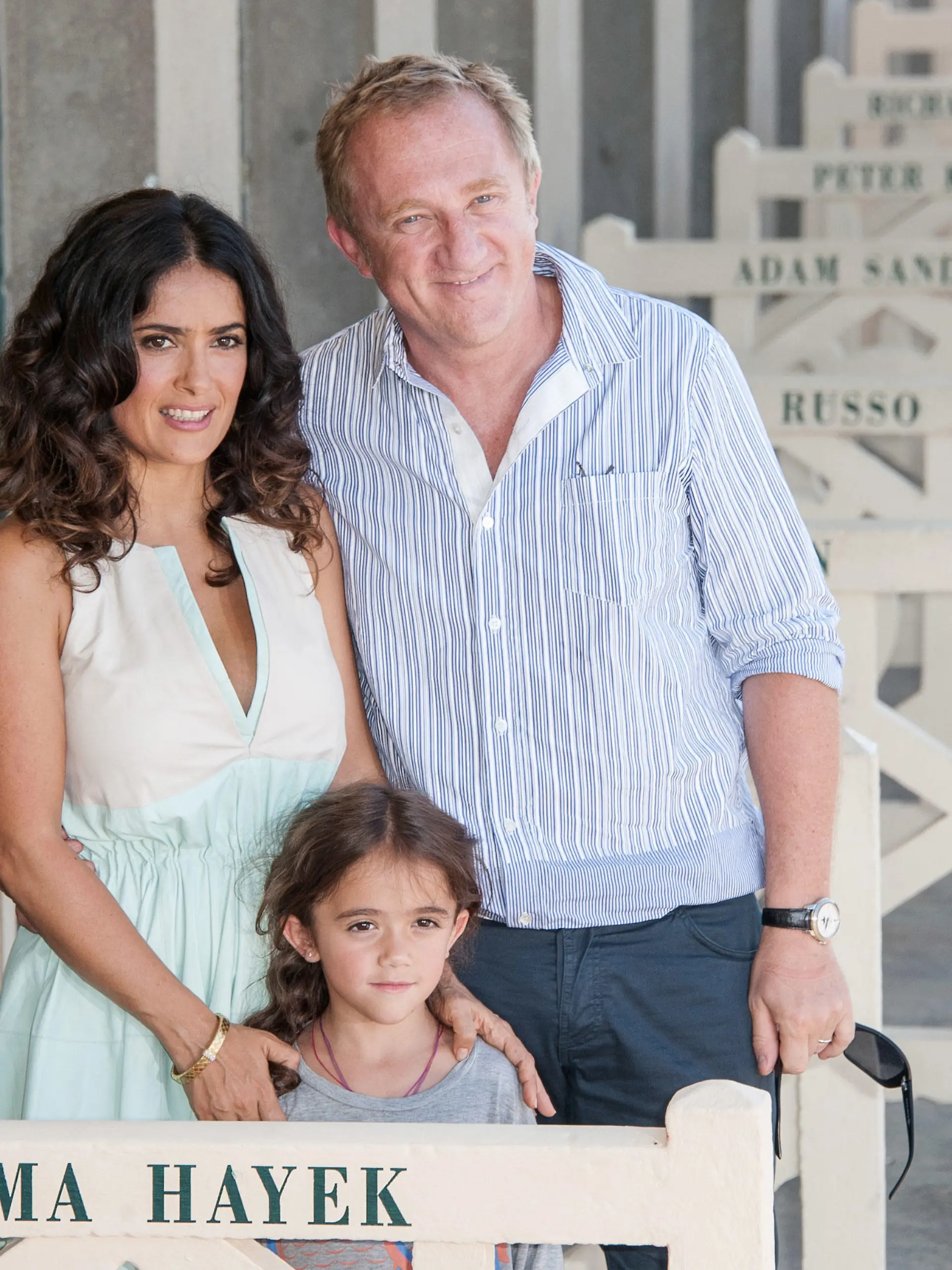 DEAUVILLE, FRANCE - SEPTEMBER 08:  Salma Hayek poses her husband Francois-Henri Pinault with their daughter Valentina Paloma Pinault as she unveiled the beach locker room dedicated to her on the Promenade des Planches during the 38th Deauville American Film Festival on September 8, 2012 in Deauville, France.  (Photo by Francois Durand/Getty Images)