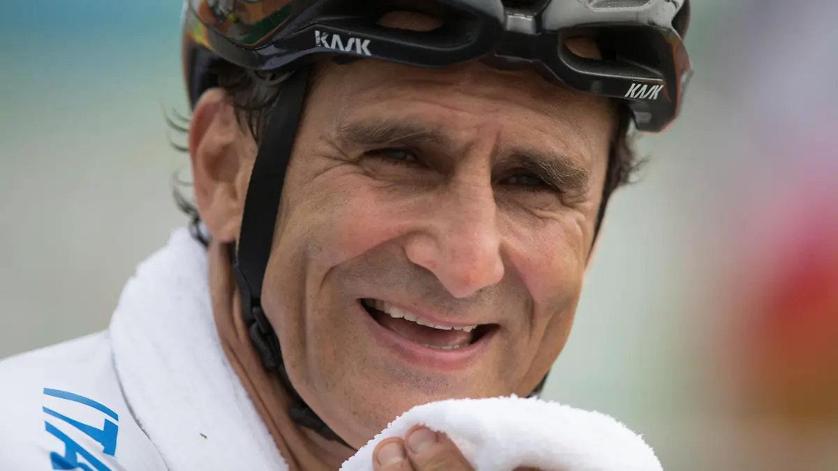 FILE - In this Thursday, Sept. 15, 2016 file photo, Italy's Alessandro "Alex" Zanardi, smiles after winning the silver medal in the men's road race H5, during the 2016 Paralympics Games, in Rio de Janeiro, Brazil. Italian auto racing champion-turned-Paralympic gold medalist Alex Zanardi was moved back into intensive care on Friday, Nov. 20, 2020 three days after being transferred to a neurological rehabilitation center. (AP Photo/Mauro Pimentel, file)