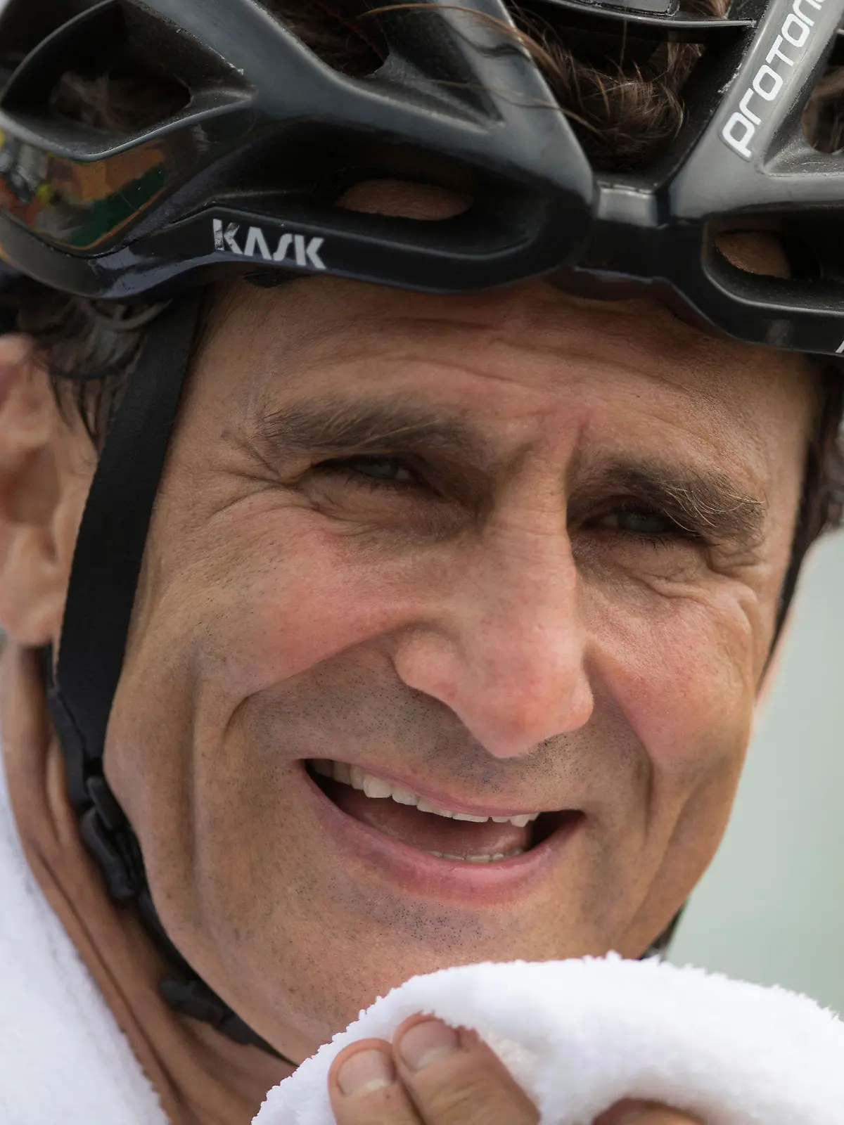 FILE - In this Thursday, Sept. 15, 2016 file photo, Italy's Alessandro "Alex" Zanardi, smiles after winning the silver medal in the men's road race H5, during the 2016 Paralympics Games, in Rio de Janeiro, Brazil. Italian auto racing champion-turned-Paralympic gold medalist Alex Zanardi was moved back into intensive care on Friday, Nov. 20, 2020 three days after being transferred to a neurological rehabilitation center. (AP Photo/Mauro Pimentel, file)