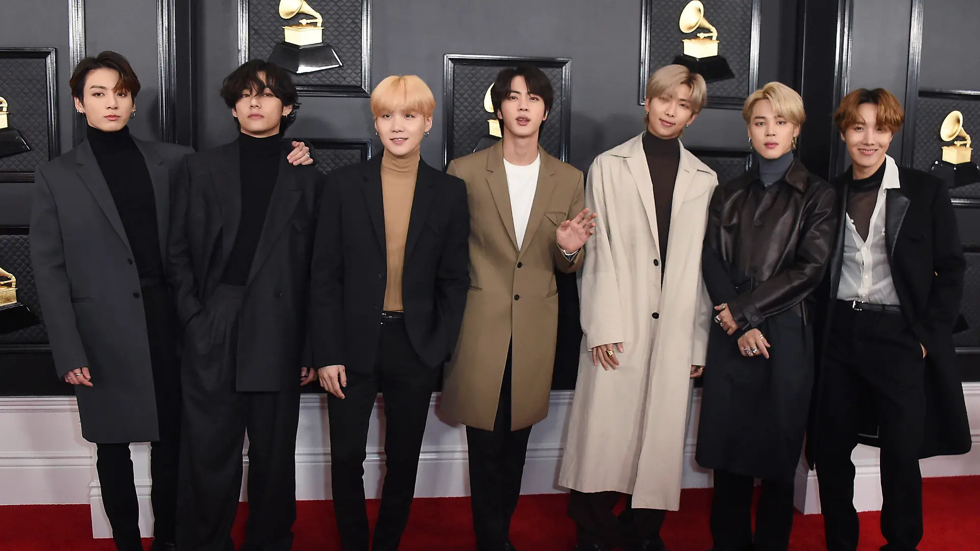 FILE - In this Jan. 26, 2020, file photo, South Korean K-pop band BTS arrives for the 62nd annual Grammy Awards in Los Angeles. BTS released a statement condemning racism against Asians and Asian Americans and Pacific Islanders (AAPI) on Tuesday, March 30, 2021. “We stand against racial discrimination,” the biggest boyband in the world, tweeted to their 34 million followers in both English and Korean. (Photo by Jordan Strauss/Invision/AP, File)