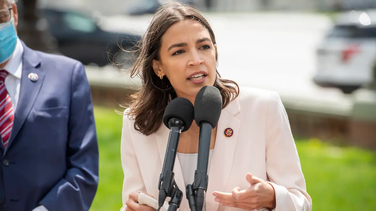  April 15, 2021, Washington, District of Columbia, USA: United States Representative Alexandria Ocasio-Cortez Democrat of New York offers remarks during a press conference on postal banking pilot programs on the East Front of the US Capitol in Washington, DC, Thursday, April 15, 2021. Credit: Rod Lamkey / CNP Washington USA - ZUMAs152 20210415_zaa_s152_350 Copyright: xRodxLamkeyx-xCnpx