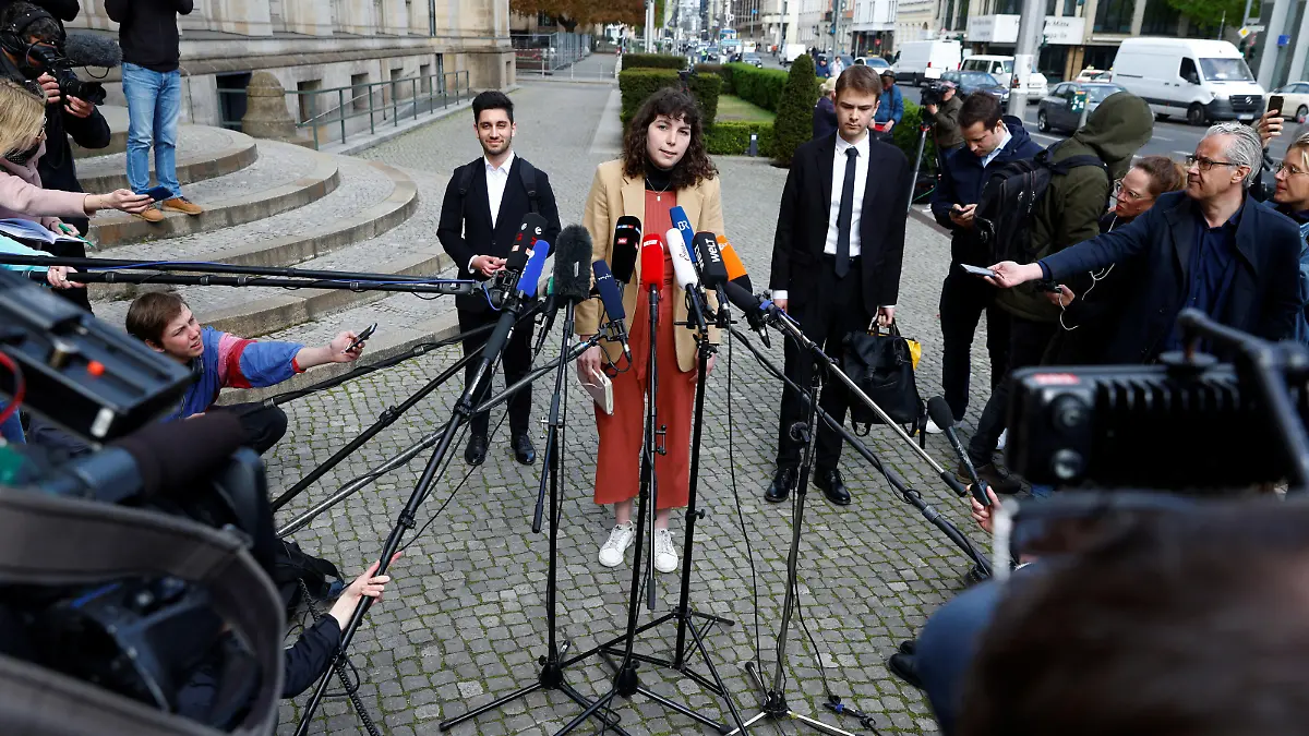 Lea Bonasera talks to the media after activists of the "Letzte Generation" (Last Generation) met with German Transport Minister Volker Wissing (not pictured) at the ministry, in Berlin, Germany, May 2, 2023. REUTERS/Michele Tantussi