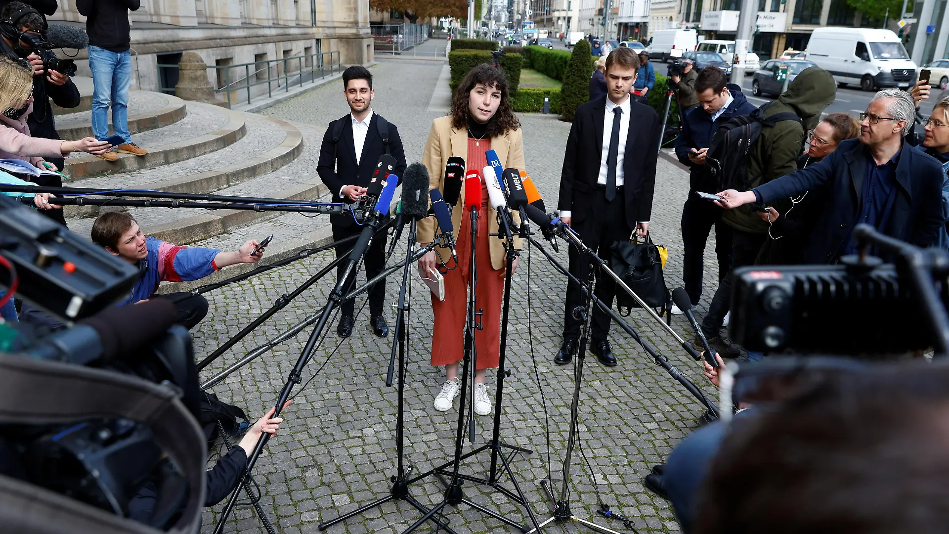 Lea Bonasera talks to the media after activists of the "Letzte Generation" (Last Generation) met with German Transport Minister Volker Wissing (not pictured) at the ministry, in Berlin, Germany, May 2, 2023. REUTERS/Michele Tantussi