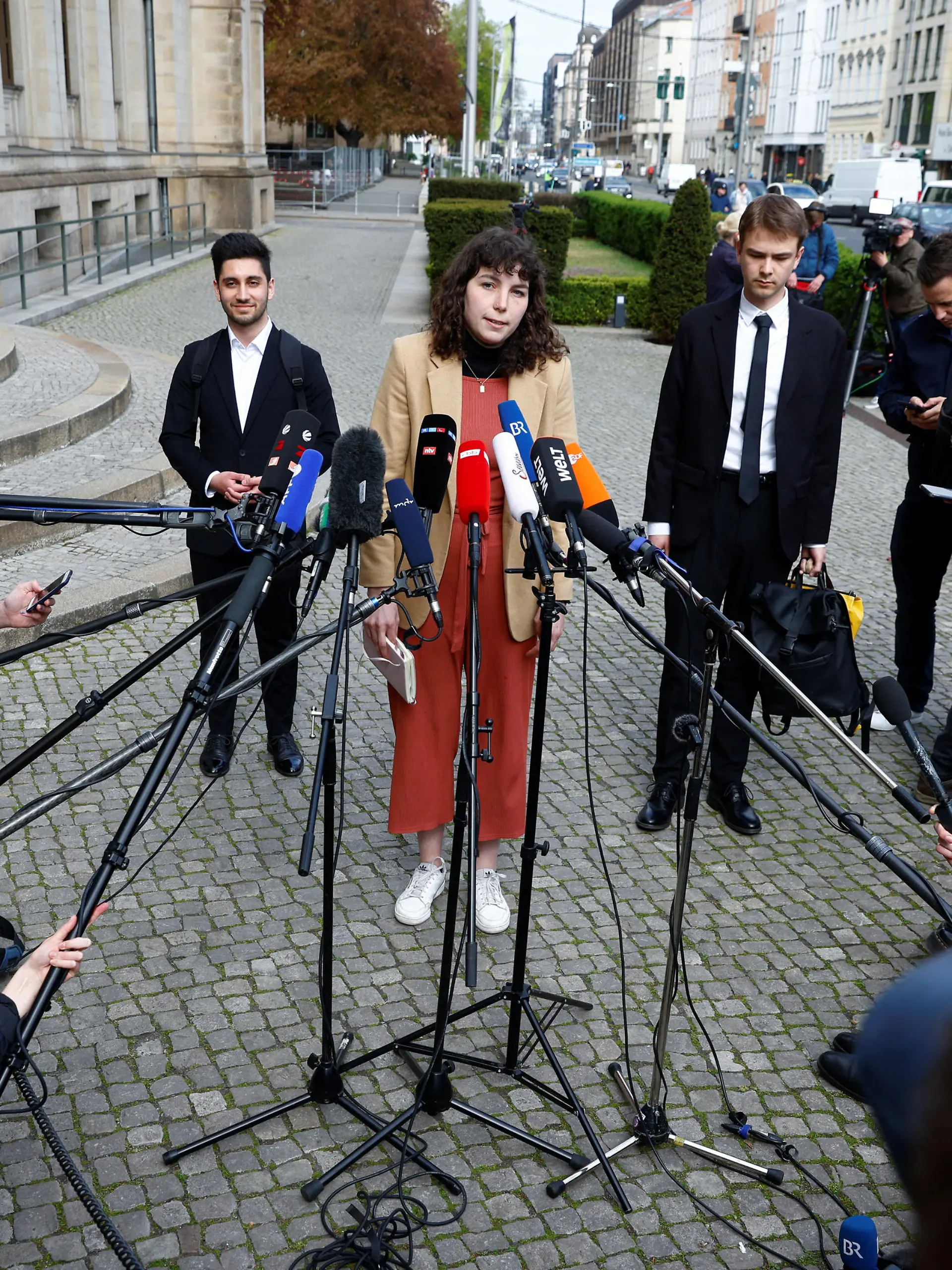 Lea Bonasera talks to the media after activists of the "Letzte Generation" (Last Generation) met with German Transport Minister Volker Wissing (not pictured) at the ministry, in Berlin, Germany, May 2, 2023. REUTERS/Michele Tantussi