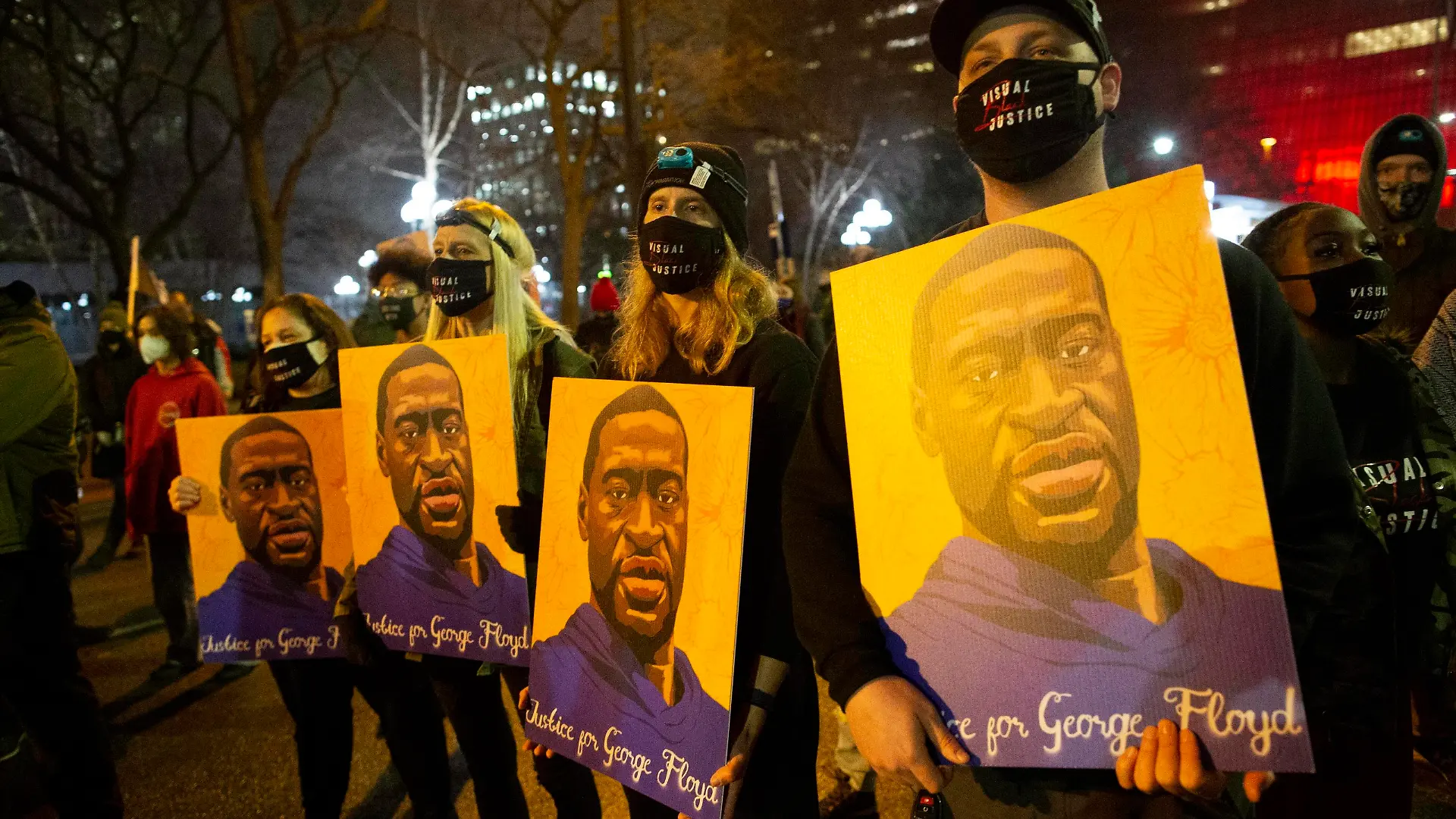 April 9, 2021, Minneapolis, Minnesota, USA: April 9, 2021-Minneapolis, Minnesota, USA: Demonstrators hold portraits of GEORGE FLOYD at a march against police brutality amid DEREK CHAUVIN s trial in Downtown Minneapolis. Minneapolis USA - ZUMAp201 20210409_znp_p201_012 Copyright: xHenryxPanx