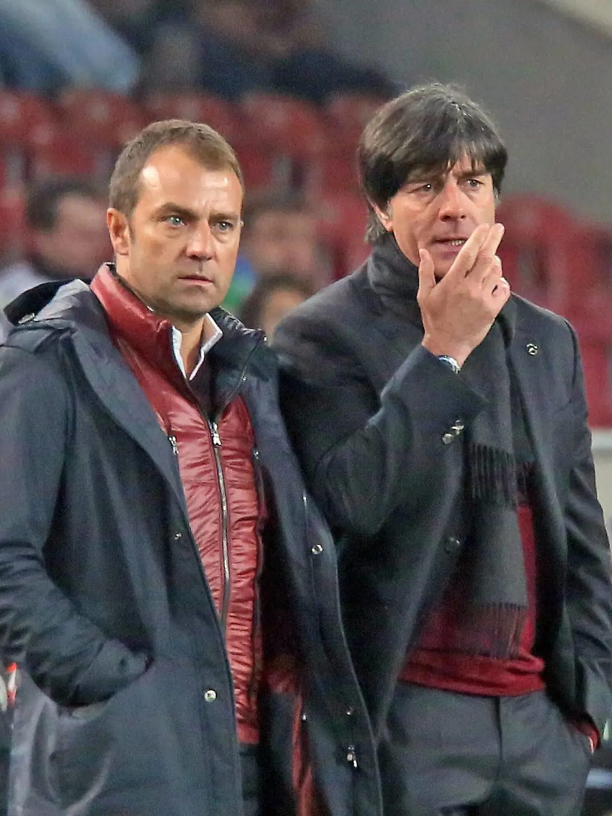 Bundestrainer Joachim Löw und Co-Trainer Hansi Flick (D) angefressen - Deutschland vs. Chile, Mercedes-Benz Arena StuttgartGerman coach Joachim Loew and Co team manager Hansi Flick D angefressen Germany vs Chile Mercedes Benz Arena Stuttgart