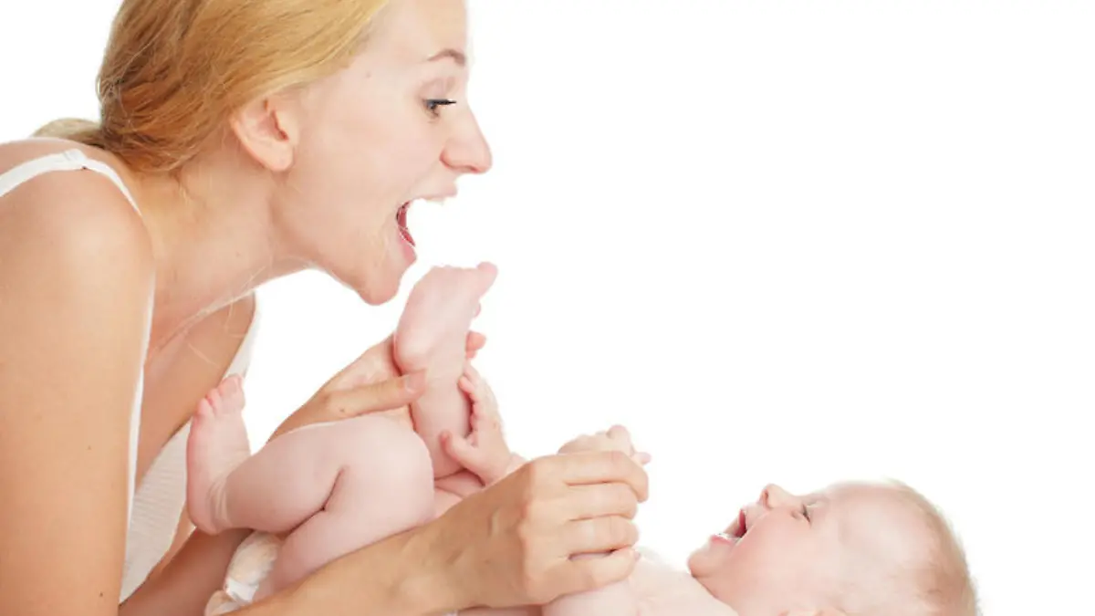 Mother with baby isolated on white