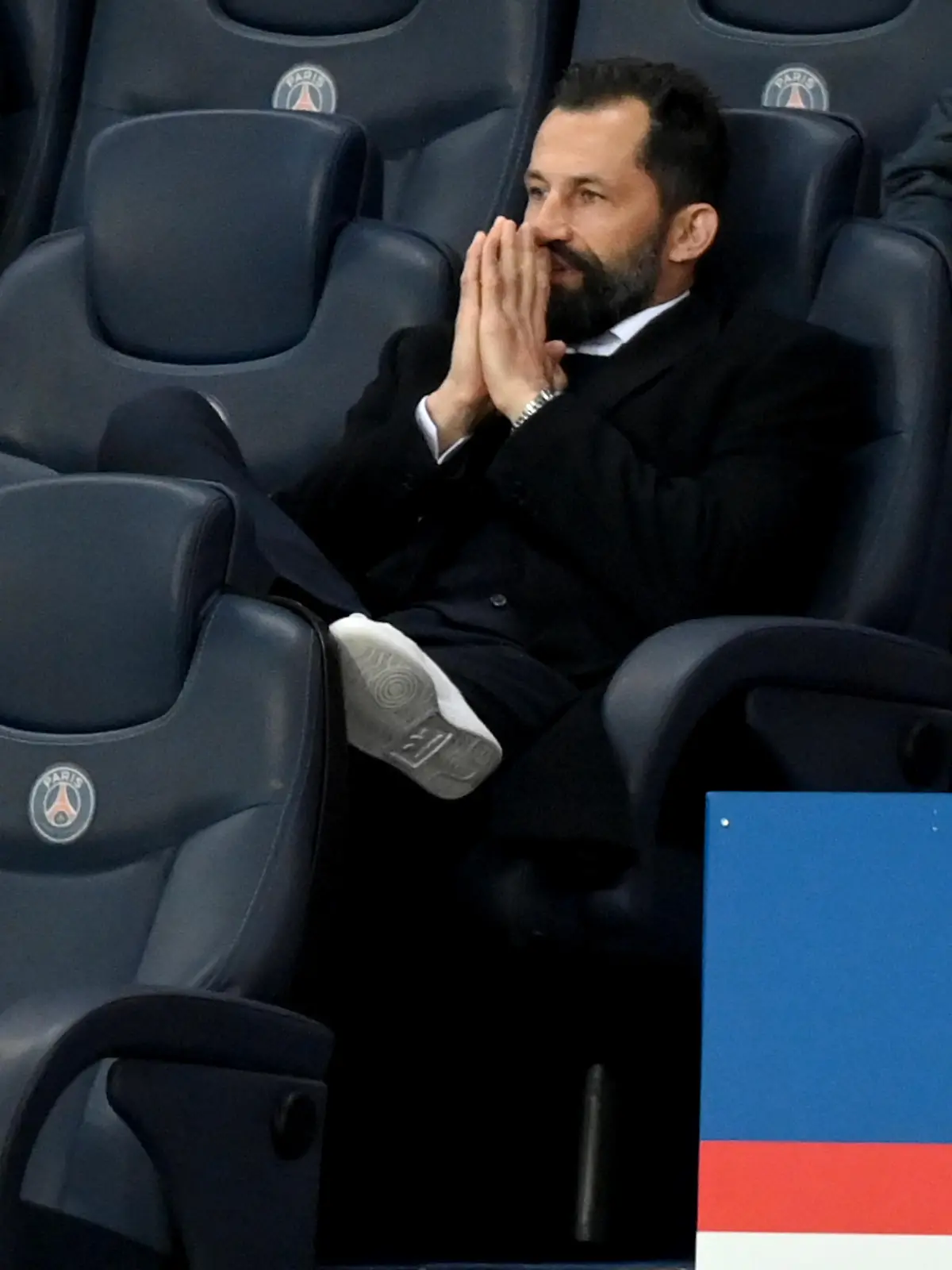 PARIS, FRANCE - APRIL 13: Hasan Salihamidzic, Sporting Director of FC Bayern Muenchen looks on from the stands during the UEFA Champions League Quarter Final Second Leg match between Paris Saint-Germain and FC Bayern Munich at Parc des Princes on April 13, 2021 in Paris, France. Sporting stadiums around France remain under strict restrictions due to the Coronavirus Pandemic as Government social distancing laws prohibit fans inside venues resulting in games being played behind closed doors. (Photo by Matthias Hangst/Getty Images)
