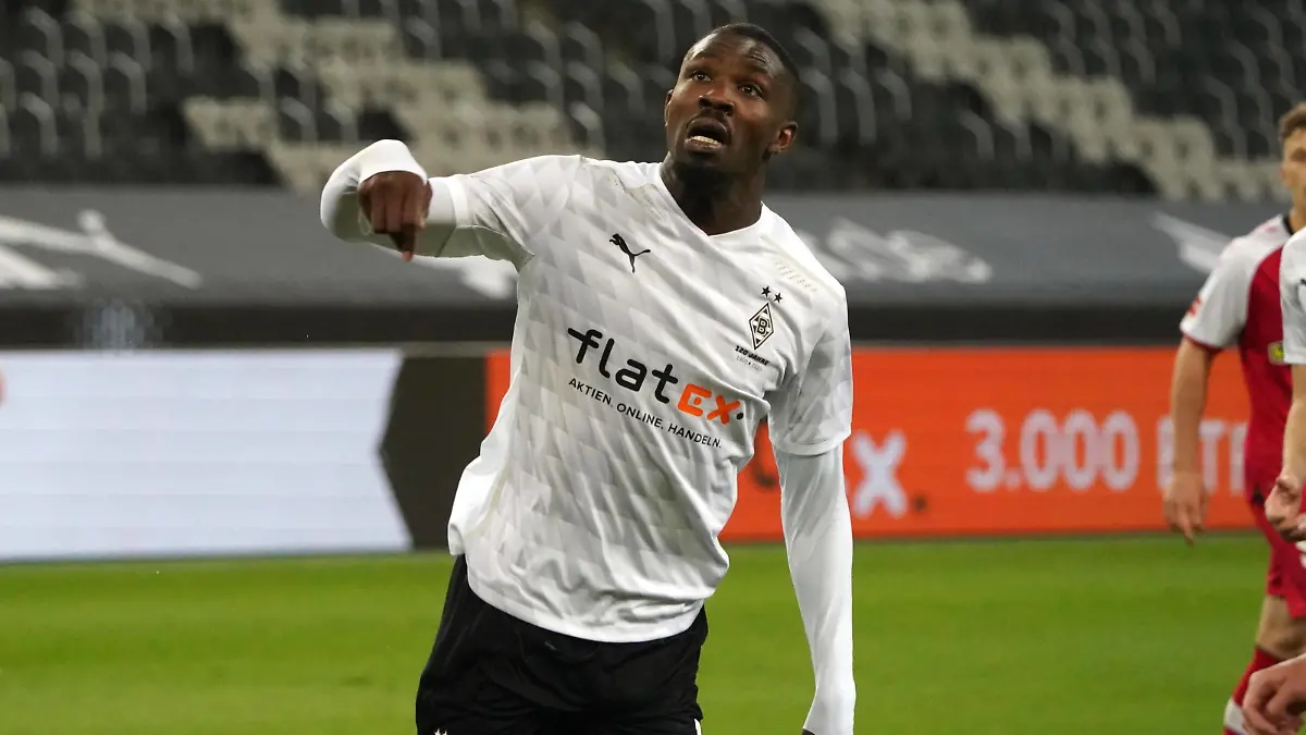 Moenchengladbach, Borussia Park, 03.04.21, GER, Herren, 1.Bundesliga, Saison 2020-2021, Borussia Moenchengladbach - SC Freiburg Marcus Thuram, Borussia Mönchengladbach, Aktion, Einzelbild Foto: Gladys Chai von der Laage Nur fuer journalistische Zwecke Only for editorial use Gemaess den Vorgaben der DFL Deutsche Fußball Liga ist es untersagt, in dem Stadion und/oder vom Spiel angefertigte Fotoaufnahmen in Form von Sequenzbildern und/oder videoaehnlichen Fotostrecken zu verwerten bzw. verwerten zu lassen. DFL regulations prohibit any use of photographs as image sequences and/or quasi-video. *** Moenchengladbach, Borussia Park, 03 04 21, GER, Herren, 1 Bundesliga, Saison 2020 2021, Borussia Moenchengladbach SC Freiburg Marcus Thuram, Borussia Mönchengladbach, Aktion, Einzelbild Foto Gladys Chai von der Laage Nur fuer journalistische Zwecke Only for editorial use According to the regulations of the DFL Deutsche Fußball Liga it is prohibited, DFL regulations prohibit any use of photographs as image sequences and or quasi video, in the stadium and or from the game. 