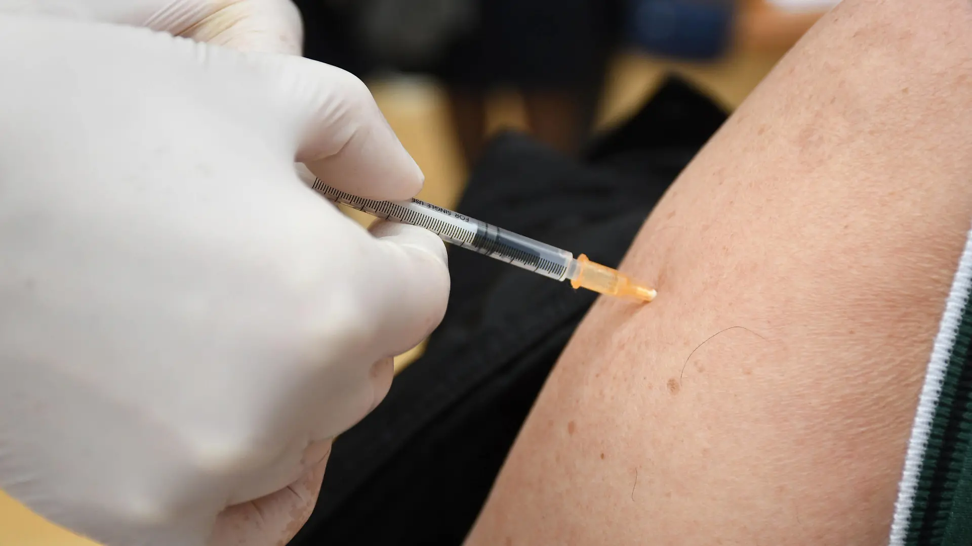 CROATIA COVID-19 mass vaccination A woman receives the Pfizer-BioNTech Comirnaty coronavirus disease COVID-19 vaccine during a mass vaccination at Koprivnica sports hall in Koprivnica, Croatia on April 10, 2021. DamirxSpehar/PIXSELL 