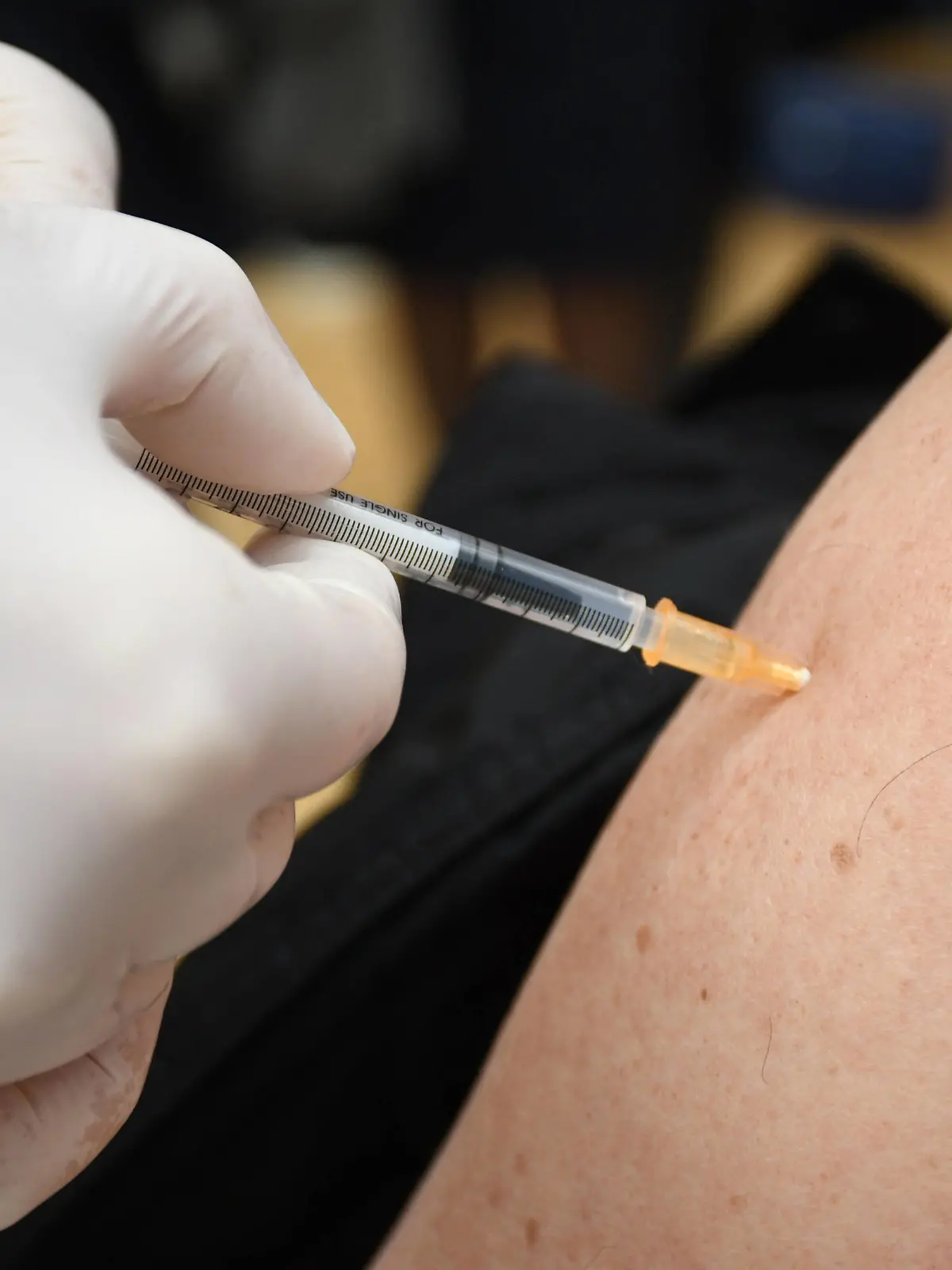 CROATIA COVID-19 mass vaccination A woman receives the Pfizer-BioNTech Comirnaty coronavirus disease COVID-19 vaccine during a mass vaccination at Koprivnica sports hall in Koprivnica, Croatia on April 10, 2021. DamirxSpehar/PIXSELL 