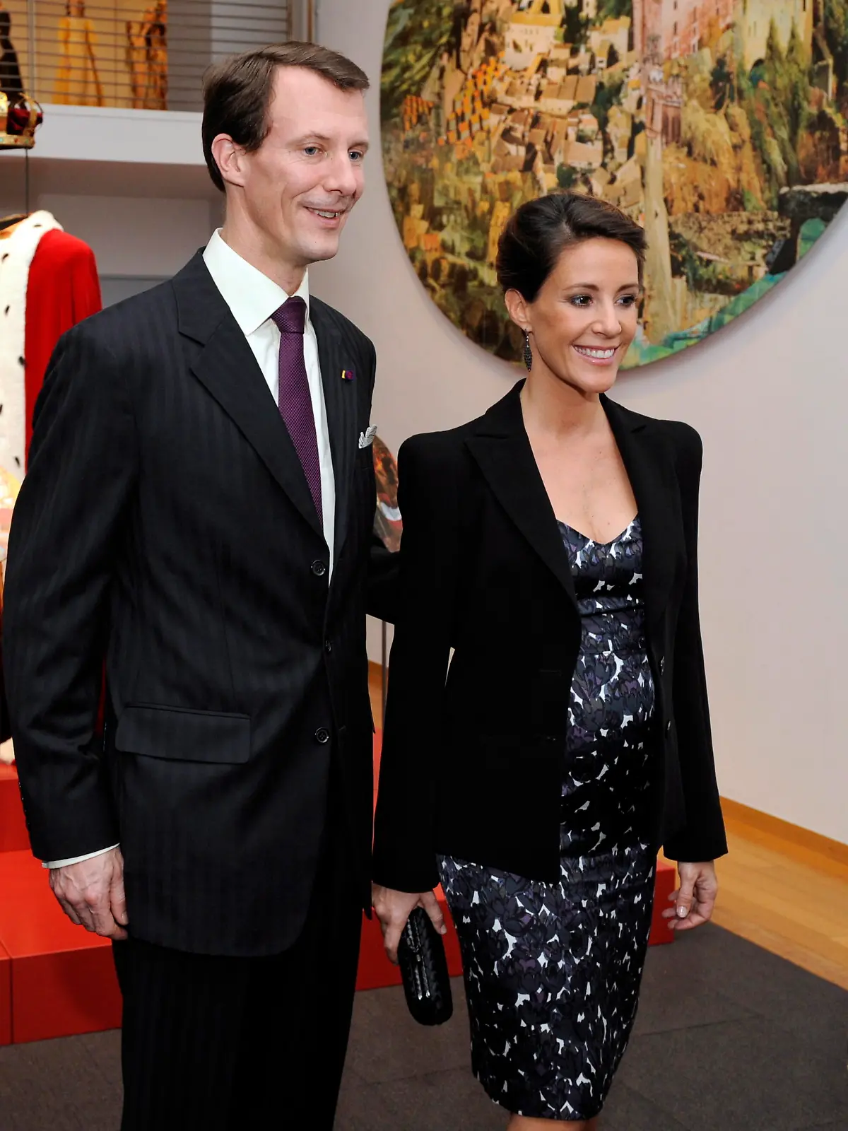 epa02990592 Danish Prince Joachim (L) and his wife Princess Marie (R) smile as they visit the Wild Swans Exhibition in Tokyo, Japan, 03 November 2011. The exhibition presents artworks by Queen Margrethe II based on the fairytale written in 1838 by Danish author Hans Christian Andersen. Prince Joachim and Princess Marie are currently on a six-day visit to Japan. EPA/FRANCK ROBICHON