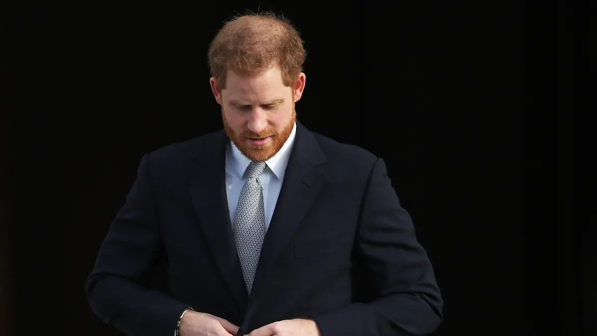ARCHIV - 16.01.2020, Großbritannien, London: Prinz Harry, Herzog von Sussex und Schirmherr der Rugby Football League, kommt als Gastgeber der Auslosung der Rugby League Weltmeisterschaft 2021 in die Gärten des Buckingham Palace. Harry hat sich mit Bedauern zu seinem Abschied von der Rolle als Mitglied der engeren Königsfamilie geäußert. Foto: Yui Mok/PA Wire/dpa +++ dpa-Bildfunk +++