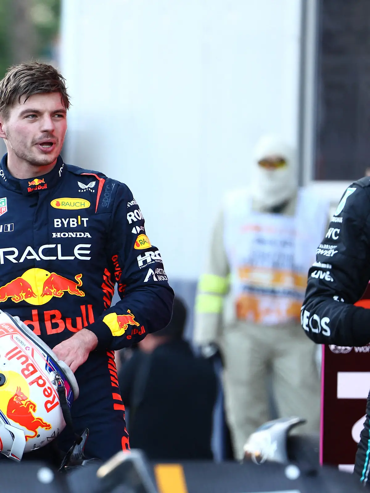 Formula One F1 - Azerbaijan Grand Prix - Baku City Circuit, Baku, Azerbaijan - April 29, 2023 Red Bull's Max Verstappen with Mercedes' George Russell after the sprint REUTERS/Lisi Niesner/Pool