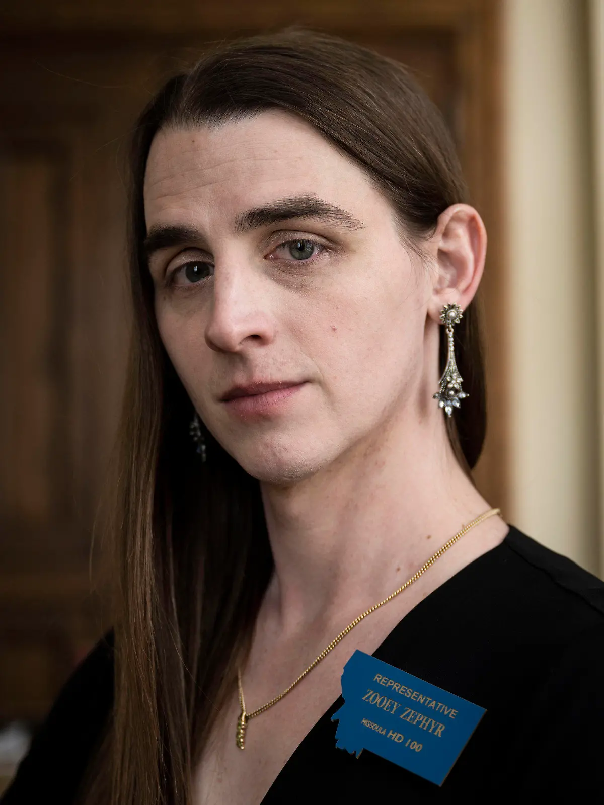 FILE - Rep. Zooey Zephyr poses for a photo at the Montana State Capitol in Helena, Mont., on Wednesday, April 26, 2023. The silencing of Zephyr, a transgender lawmaker in Montana, marks the third time in a month that Republicans have attempted to compare disruptive but otherwise peaceful protests at state capitols to insurrections. The tactic follows a pattern set over the past two years when the term has been misused to describe public demonstrations and even the 2020 election that put Democrat Joe Biden in the White House. (AP Photo/Tommy Martino, File)