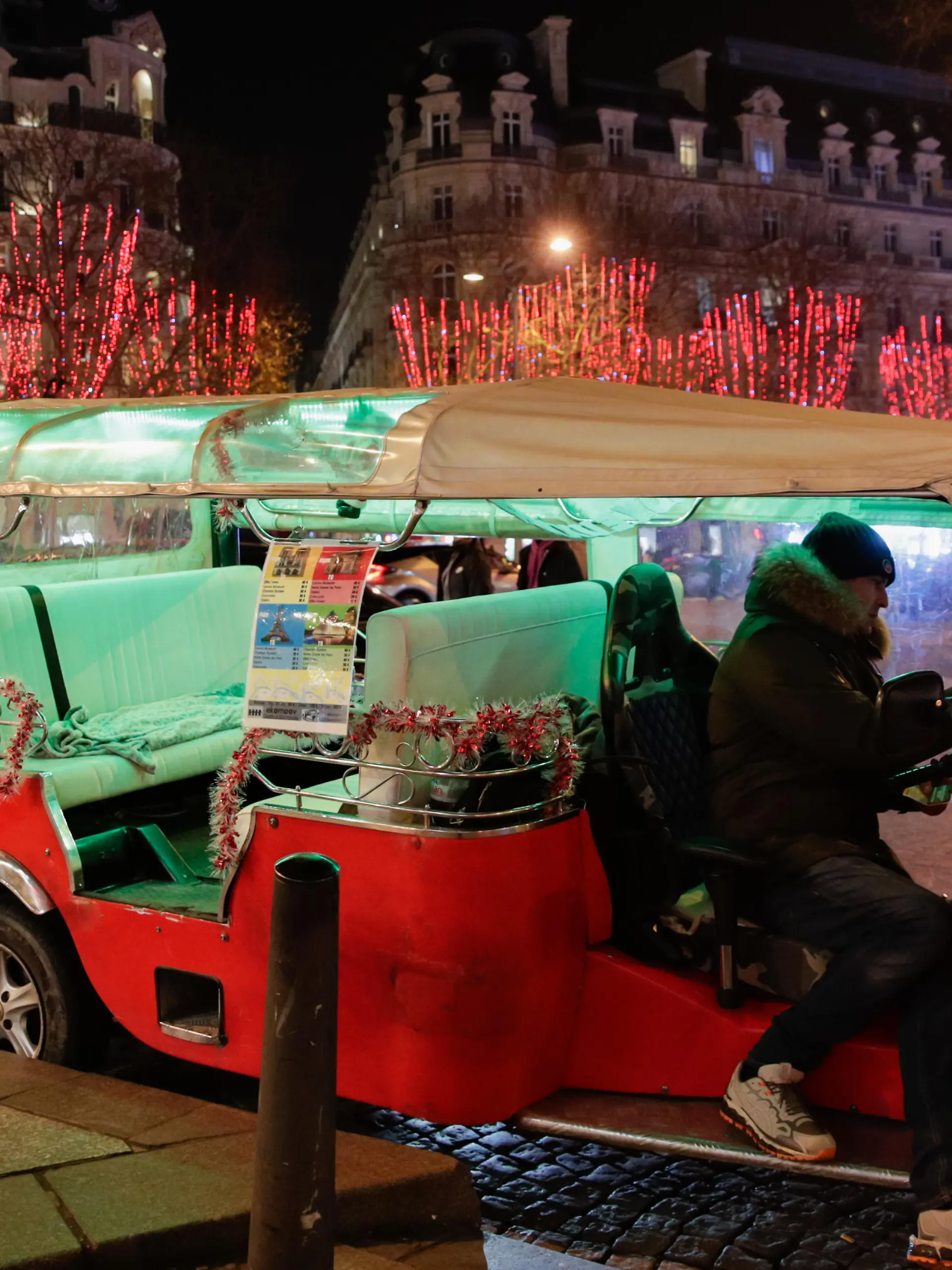 PARIS, FRANCE - DECEMBER 22: Trees covered by spotlights for Christmas are seen at the Champs-Elysees Avenue in Paris, France on December 22, 2021. Geoffroy Van der Hasselt / Anadolu Agency