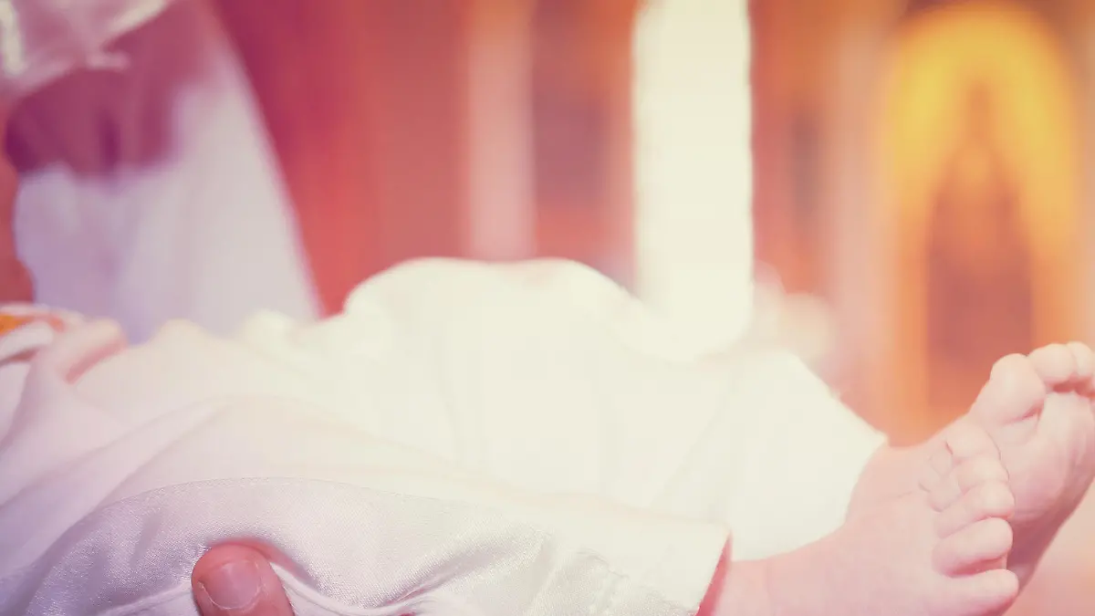 baby foot in the church after the baptism