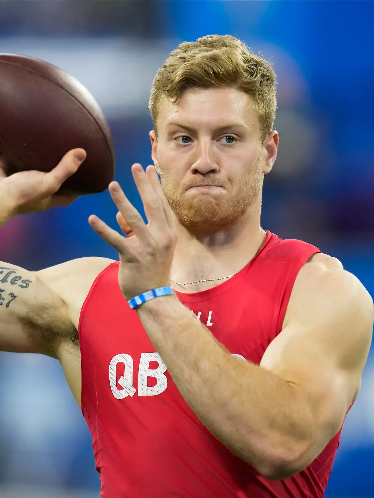 Kentucky quarterback Will Levis warms up before he runs a drill at the NFL football scouting combine in Indianapolis, Saturday, March 4, 2023. (AP Photo/Michael Conroy)