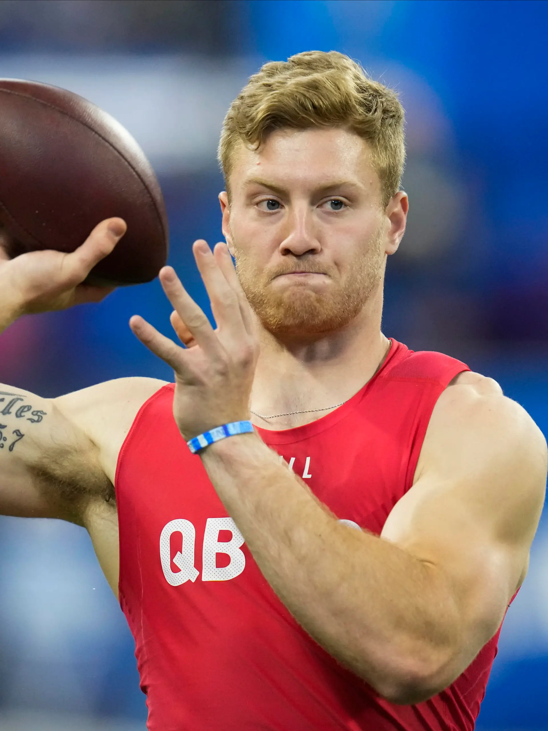 Kentucky quarterback Will Levis warms up before he runs a drill at the NFL football scouting combine in Indianapolis, Saturday, March 4, 2023. (AP Photo/Michael Conroy)