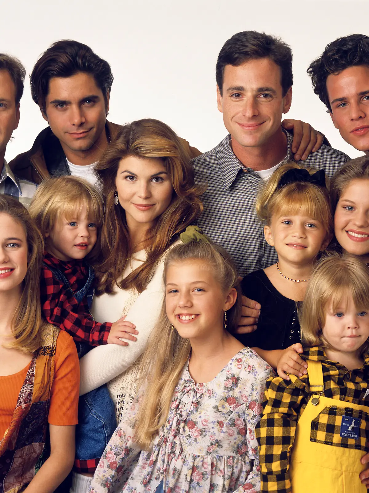 UNITED STATES - SEPTEMBER 14:  FULL HOUSE - Season Seven - Gallery - 9/14/93, Pictured, from left: Dave Coulier (Joey), Andrea Barber (Kimmy), John Stamos (Jesse), Blake Tuomy-Wilhoit (Nicky), Lori Loughlin (Rebecca), Jodie Sweetin (Stephanie), Bob Saget (Danny), Ashley Olsen (Michelle), Dylan Tuomy-Wilhoit (Alex), Candace Cameron (D.J.), Scott Weinger (Steve),  (Photo by Bob D'Amico/ABC via Getty Images)
