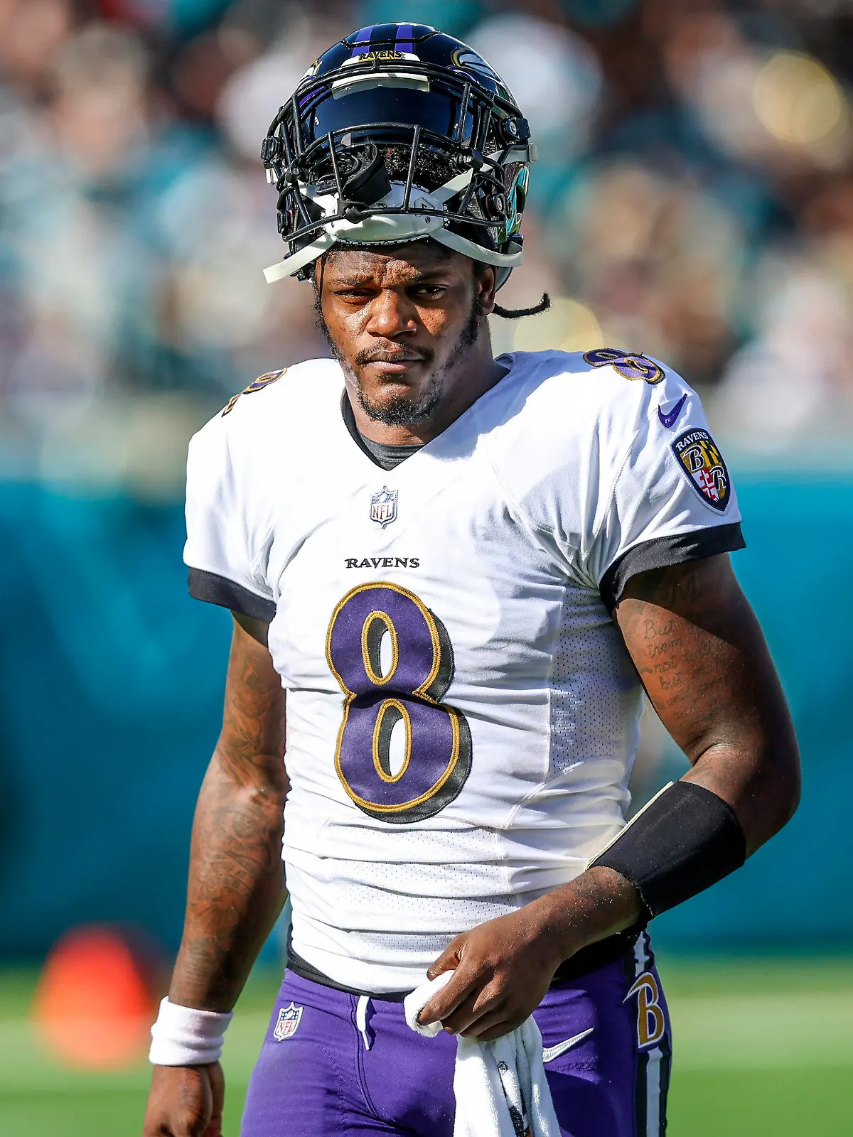 FILE - Baltimore Ravens quarterback Lamar Jackson (8) looks on during a timeout in the first half of an NFL football game against the Jacksonville Jaguars, Sunday, Nov. 27, 2022, in Jacksonville, Fla. The Ravens agreed in principle with Jackson on a five-year deal Thursday, April 27, 2023, securing their star quarterback for the foreseeable future and ending a contract negotiation saga that was dominating the team's offseason. (AP Photo/Gary McCullough, File)