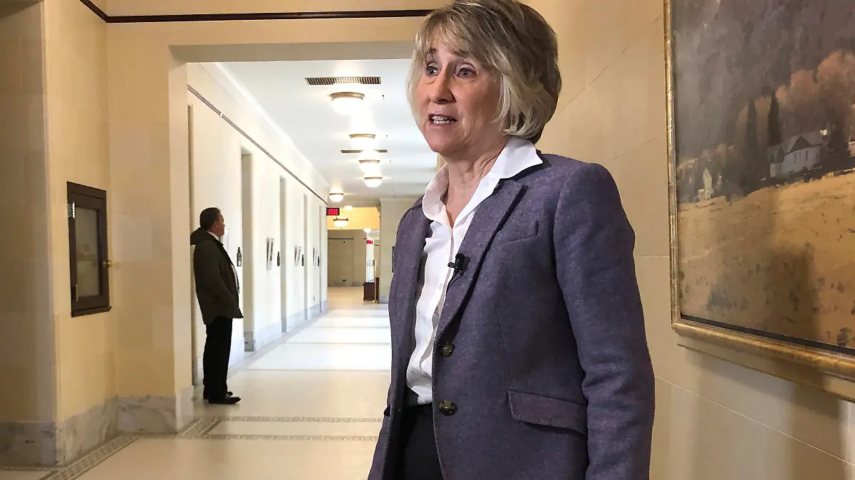 Republican Rep. Susan Pulsipher speaks outside of a hearing at the Utah State Capitol Wednesday, Nov. 20, 2019, in Salt Lake City. Amid increasing concern about vaping, Utah lawmakers are approving a proposal to allow schools to destroy confiscated e-cigarette devices. Pulsipher said that schools have seen a spike in the number of confiscated devices, but because the law is unclear they've sometimes had to return them. (AP Photo/Lindsay Whitehurst)