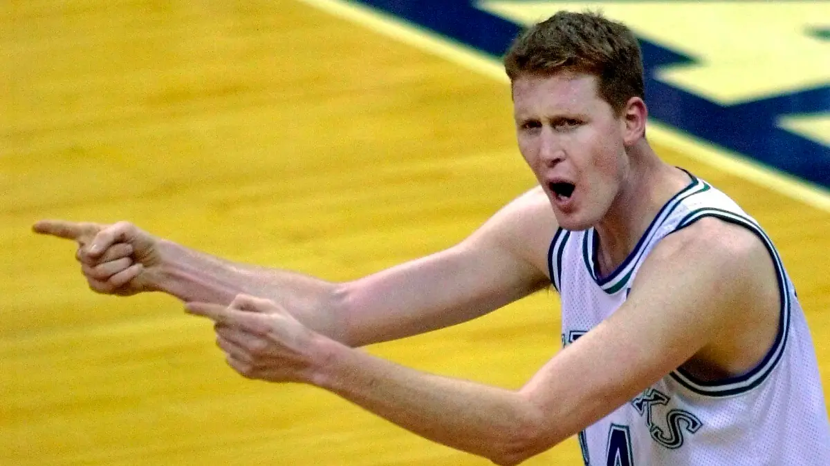 FILE - In this Feb. 17, 2001, file photo, Dallas Mavericks center Shawn Bradley reacts as he argues a defensive foul he was charged with during the second quarter of an NBA basketball game against the Washington Wizards in Dallas. Former NBA player Shawn Bradley was paralyzed when he was struck from behind by a vehicle while riding a bike near his Utah home, saying in a statement nearly two months after the accident he intended to bring awareness to bicycle safety. (AP Photo/Bill Janscha)