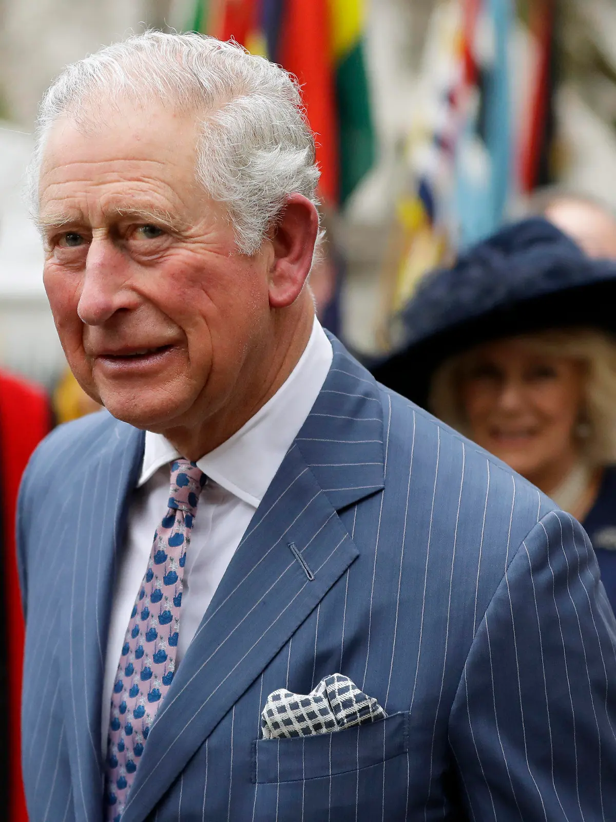 FILE - In this Monday, March 9, 2020 file photo, Britain's Prince Charles and Camilla the Duchess of Cornwall, in the background, leave after attending the annual Commonwealth Day service at Westminster Abbey in London. Prince Charles celebrated his 72nd birthday, on Saturday, Nov. 14, 2020, marking an eventful year that saw him contract the coronavirus and his son Prince Harry step down from official royal duties. Gun salutes would normally be fired from London’s Green Park and the Tower of London to mark the heir to the throne’s birthday, but officials said the ceremonies won’t take place this year due to COVID-19 restrictions. Charles’ eldest son Prince William and his wife, Kate, were among those wishing him a happy birthday on social media. (AP Photo/Kirsty Wigglesworth, File)