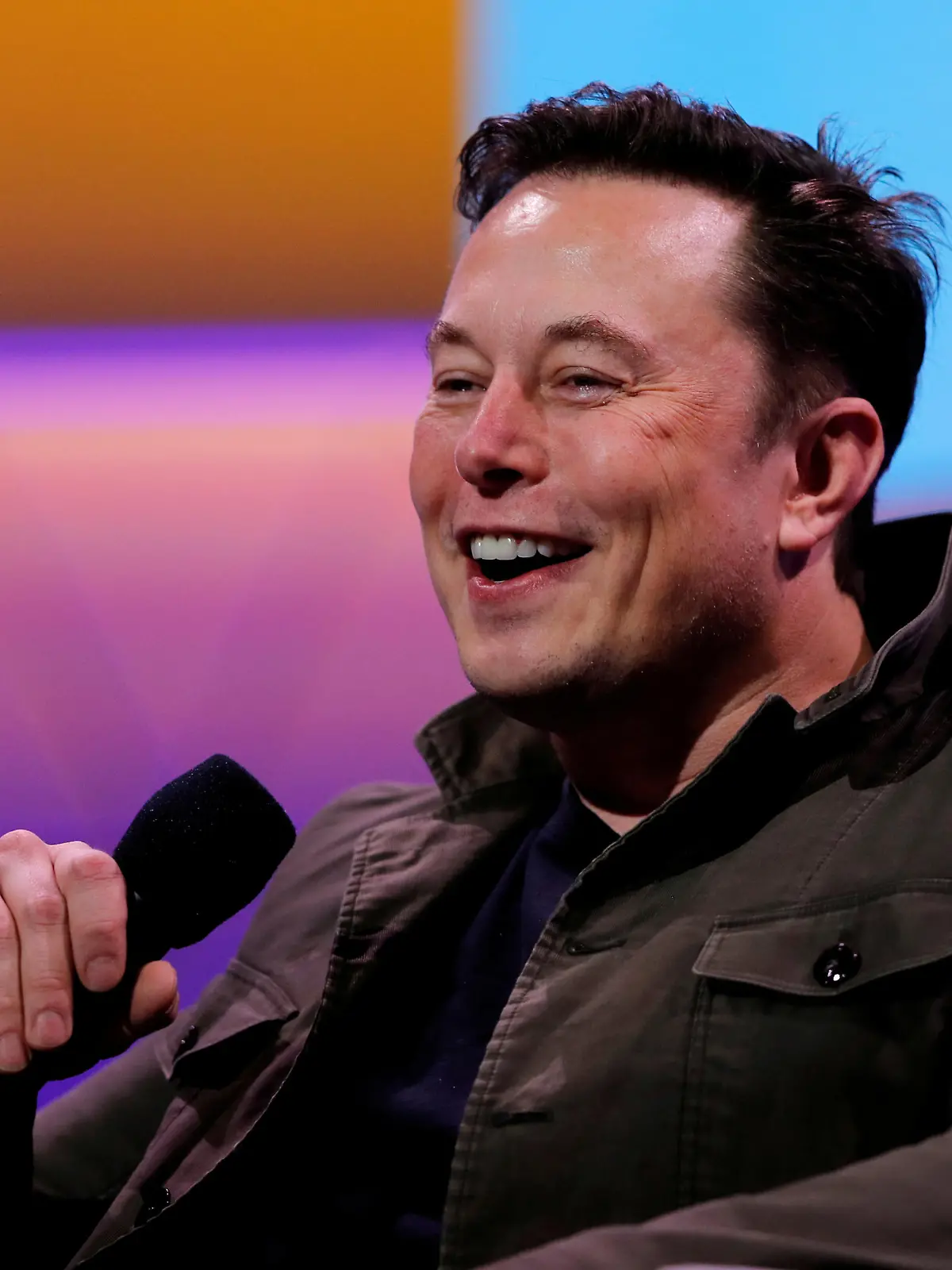 FILE PHOTO: Tesla CEO Elon Musk speaks during a conversation with legendary game designer Todd Howard (not pictured) at the E3 gaming convention in Los Angeles, California, U.S., June 13, 2019.  REUTERS/Mike Blake/File Photo