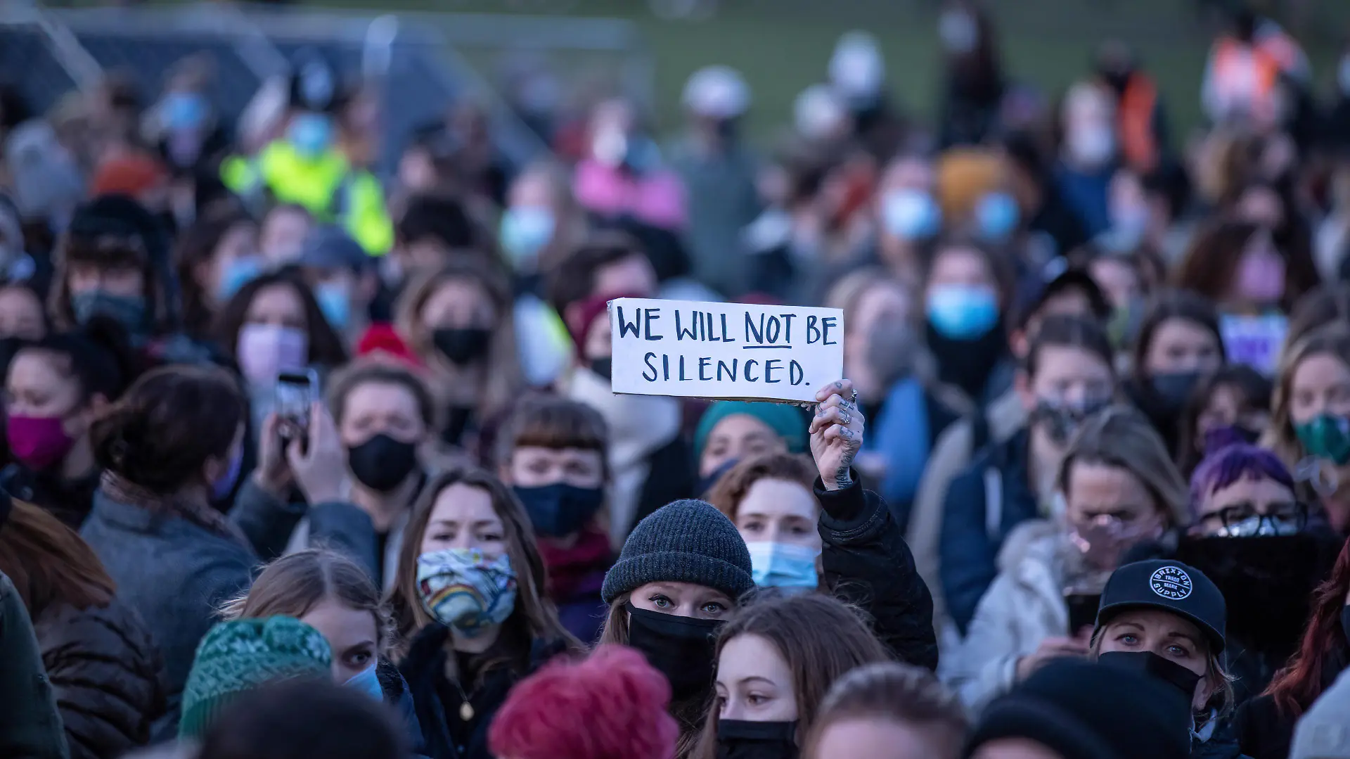 March 13, 2021, London, United Kingdom: A protester holding a placard saying, we will not be silenced, during the vigil for Sarah Everard being held at Clapham Common..33 year old Sarah Everard was walking to her home in Brixton when she was kidnaped and murdered by a London Metropolitan Police officer. London United Kingdom - ZUMAs197 20210313_zaa_s197_192 Copyright: xPhilxLewisx
