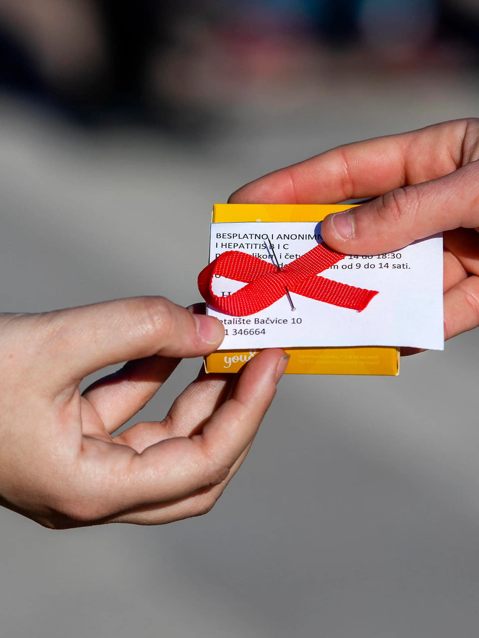  PXL_World AIDS Day On the occasion of the World AIDS Day, volunteers from the Youth Aid Association HELP shared red ribbons and condoms and also educated citizens about the importance of HIV testing, in Split, Croatia ,on Dec 01, 2020. MiroslavxLelas/PIXSELL