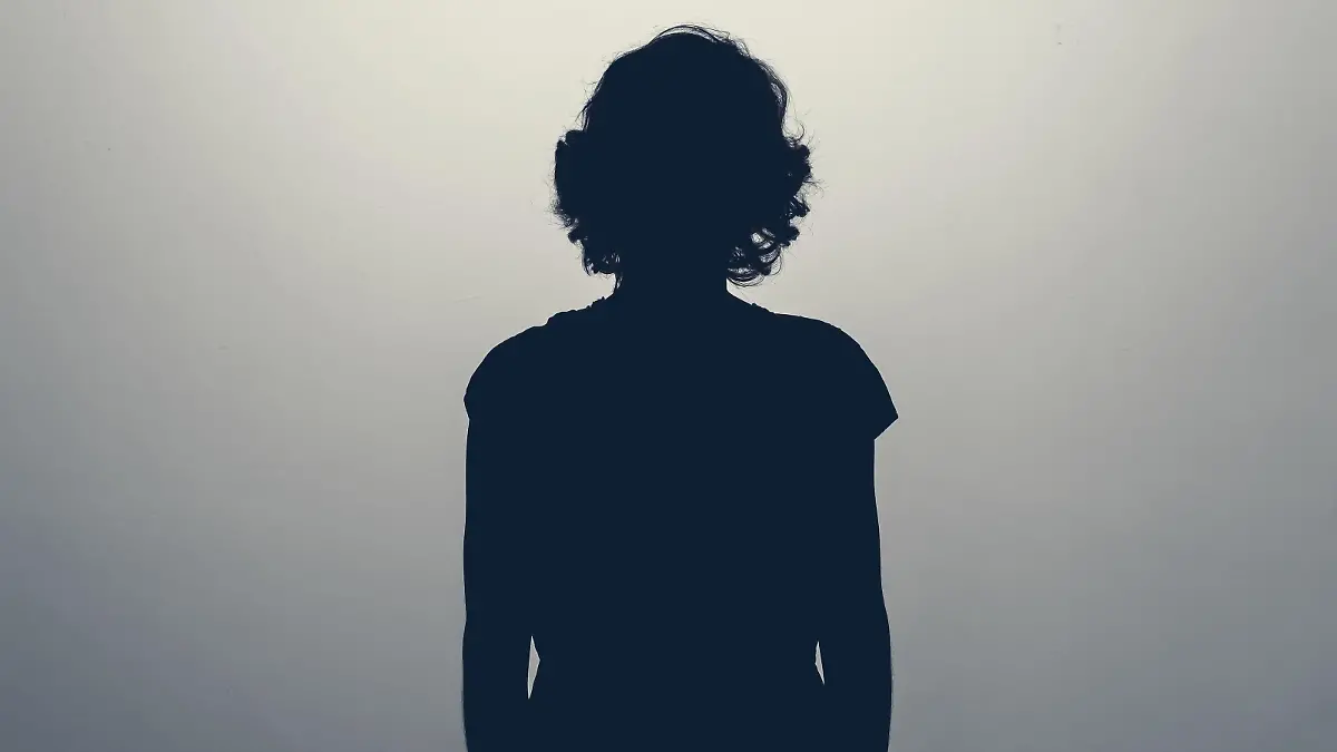 Unknown female person silhouette in studio. Concept of depression, stress or anonymous