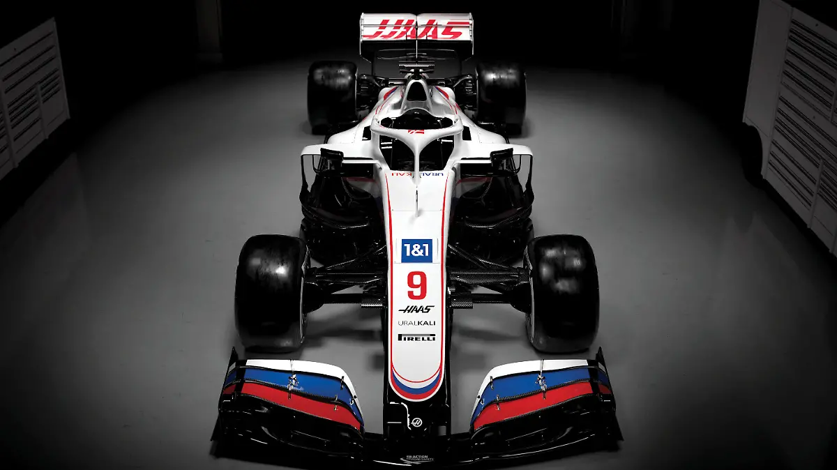 HANDOUT - 04.03.2021, ---: Die am 04. März 2021 vom Uralkali-Haas-F1-Team zur Verfügung gestellte Aufnahme zeigt den neuen Formel-1-Rennwagen mit der Bezeichnung VF-21. Foto: -/Haas F1 Team/dpa - ACHTUNG: Nur zur redaktionellen Verwendung und nur mit vollständiger Nennung des vorstehenden Credits +++ dpa-Bildfunk +++
