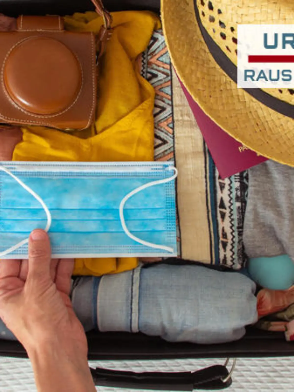 Koffer mit Reiseutensilien