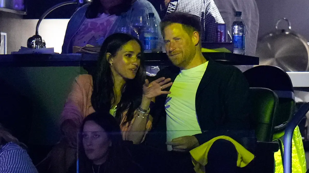 Prince Harry and Meghan Markle attend the Los Angeles Lakers' Game 4 of a first-round NBA basketball playoff series against the Memphis Grizzlies Monday, April 24, 2023, in Los Angeles. (AP Photo/Jae C. Hong)