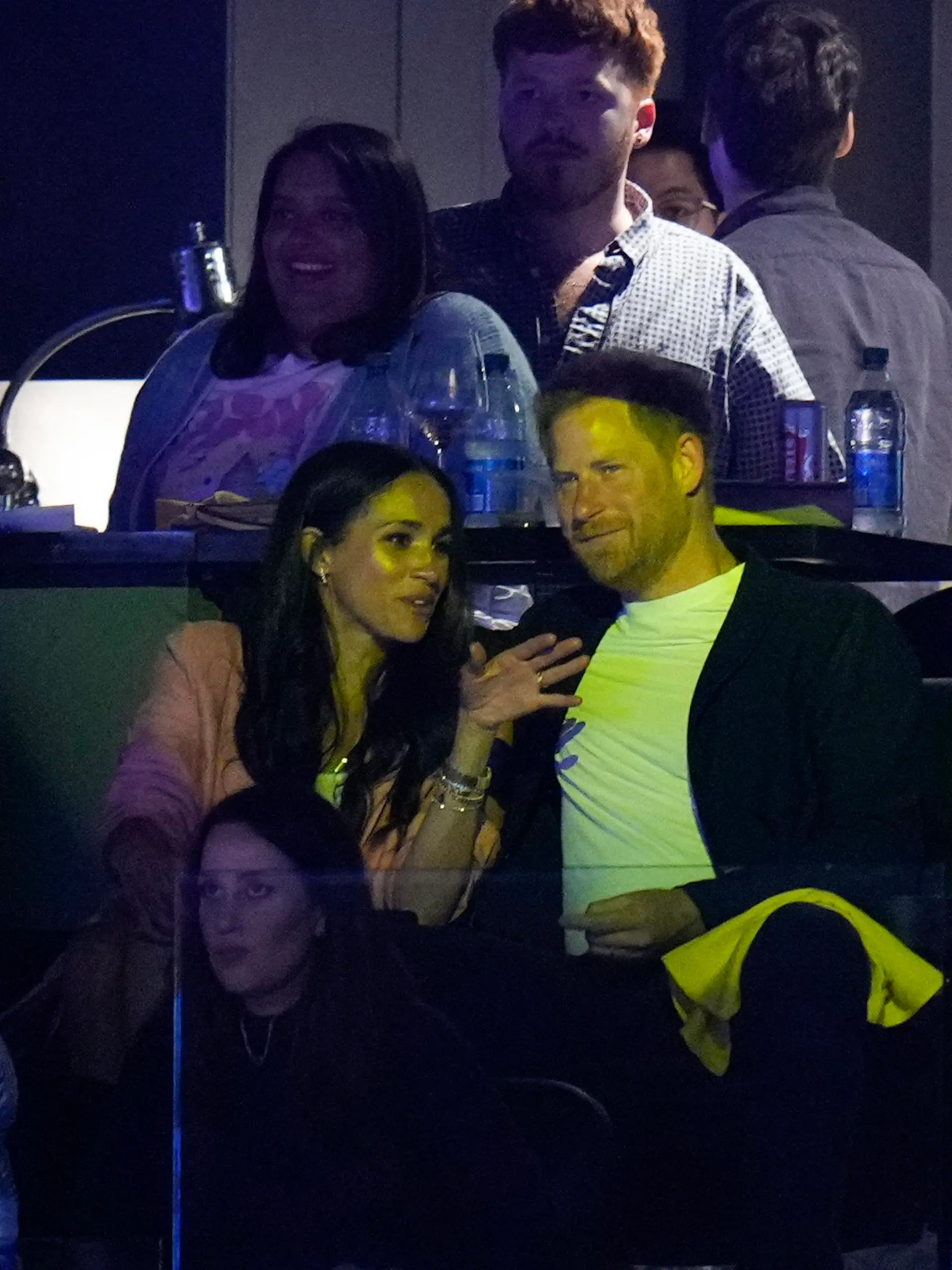 Prince Harry and Meghan Markle attend the Los Angeles Lakers' Game 4 of a first-round NBA basketball playoff series against the Memphis Grizzlies Monday, April 24, 2023, in Los Angeles. (AP Photo/Jae C. Hong)