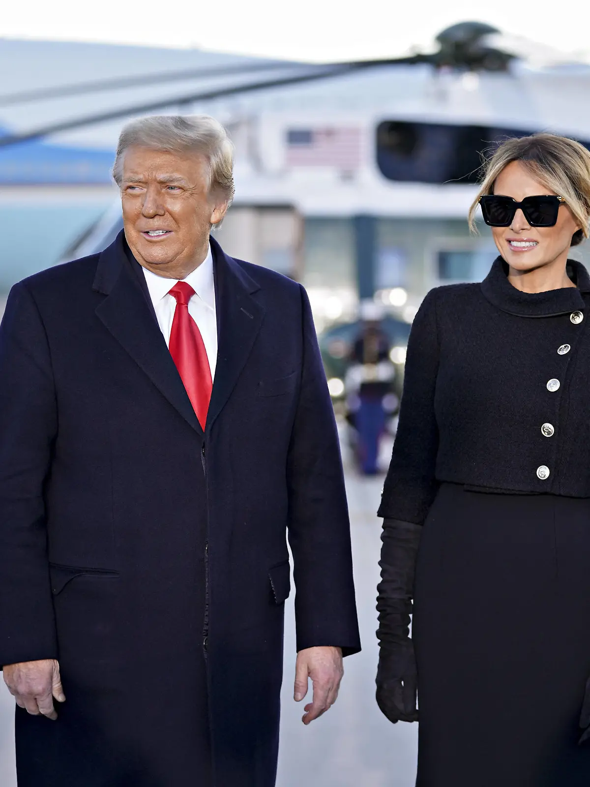  U.S. President Donald Trump, left, and U.S. First Lady Melania Trump arrive to a farewell ceremony at Joint Base Andrews, Maryland, U.S., on Wednesday, Jan. 20, 2021. Trump departs Washington with Americans more politically divided and more likely to be out of work than when he arrived, while awaiting trial for his second impeachment - an ignominious end to one of the most turbulent presidencies in American history. PUBLICATIONxNOTxINxUSA Copyright: xStefanixReynoldsx/xPoolxviaxCNPx/MediaPunchx