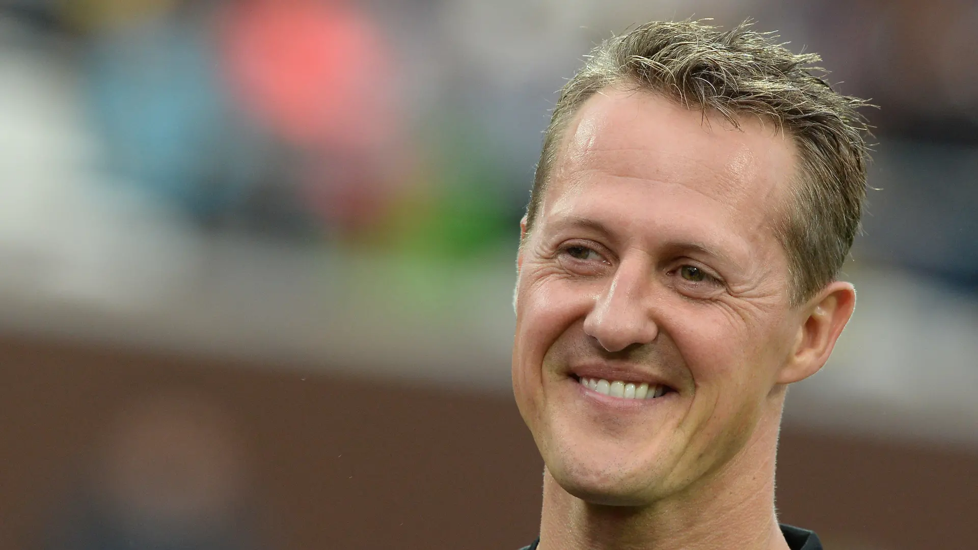 ARCHIV - Der siebenmalige Formel-1-Weltmeister und Schirmherr, Michael Schumacher, steht am 08.09.2013 in Hamburg nach dem «Tag der Legenden» im Millerntor-Stadion in Hamburg. Vier Jahre ist er her. Der Unfall, der das Leben von Michael Schumacher gravierend veränderte. (zu dpa-Meldung: «Momente der Stille: «Wir vermissen Michael Schumacher»» vom 28.12.2017) Foto: Marcus Brandt/dpa +++(c) dpa - Bildfunk+++