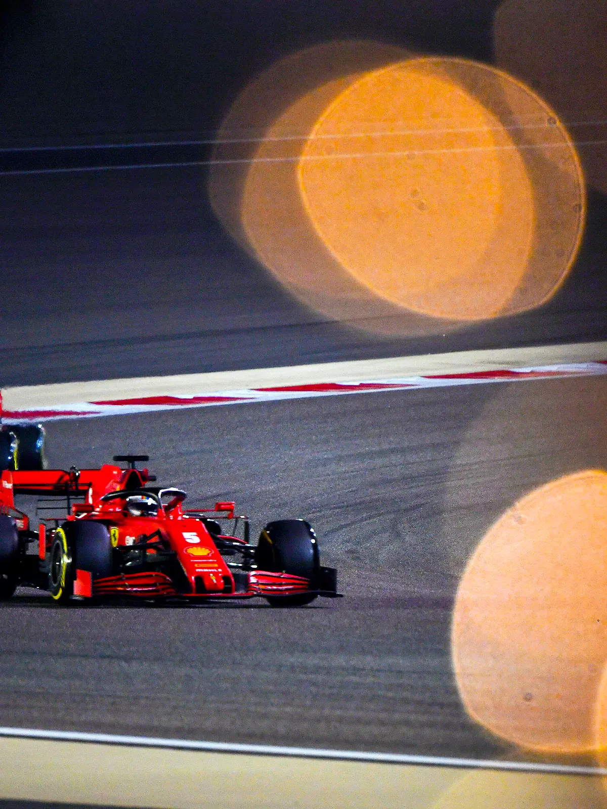  2020 Bahrain GP BAHRAIN INTERNATIONAL CIRCUIT, BAHRAIN - NOVEMBER 28: Sebastian Vettel, Ferrari SF1000, leads Charles Leclerc, Ferrari SF1000 during the Bahrain GP at Bahrain International Circuit on Saturday November 28, 2020 in Sakhir, Bahrain. Photo by Mark Sutton / Sutton Images Images PUBLICATIONxINxGERxSUIxAUTxHUNxONLY GP2015_152846MS1_5614