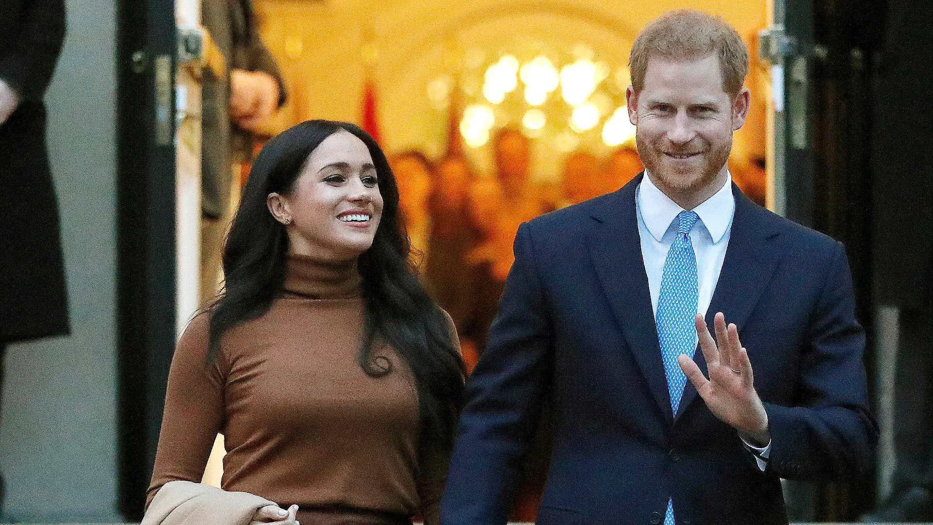 FILE - Prince Harry and Meghan, the Duke and Duchess of Sussex, leave after visiting Canada House on Jan. 7, 2020, in London. Harry and Meghan stepped away from full-time royal life in early 2020, and Buckingham Palace on Friday Feb. 19, 2021, confirmed the couple will not be returning to royal duties, and Harry will give up his honorary military titles. (AP Photo/Frank Augstein, File)