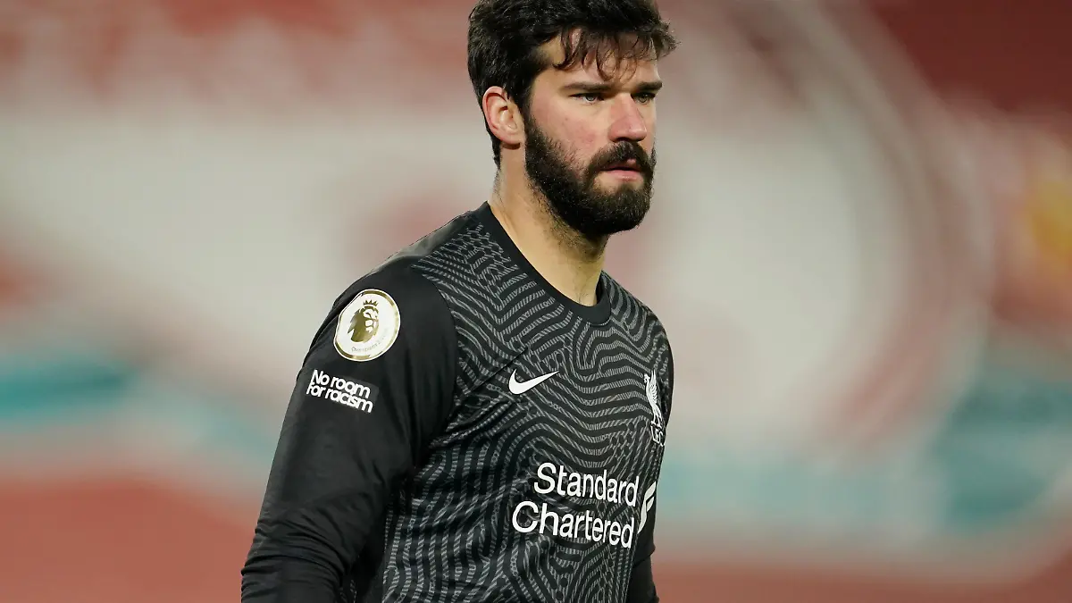 LIVERPOOL, ENGLAND - FEBRUARY 07: Alisson Becker of Liverpool looks on during the Premier League match between Liverpool and Manchester City at Anfield on February 07, 2021 in Liverpool, England. Sporting stadiums around the UK remain under strict restrictions due to the Coronavirus Pandemic as Government social distancing laws prohibit fans inside venues resulting in games being played behind closed doors (Photo by Jon Super - Pool/Getty Images)