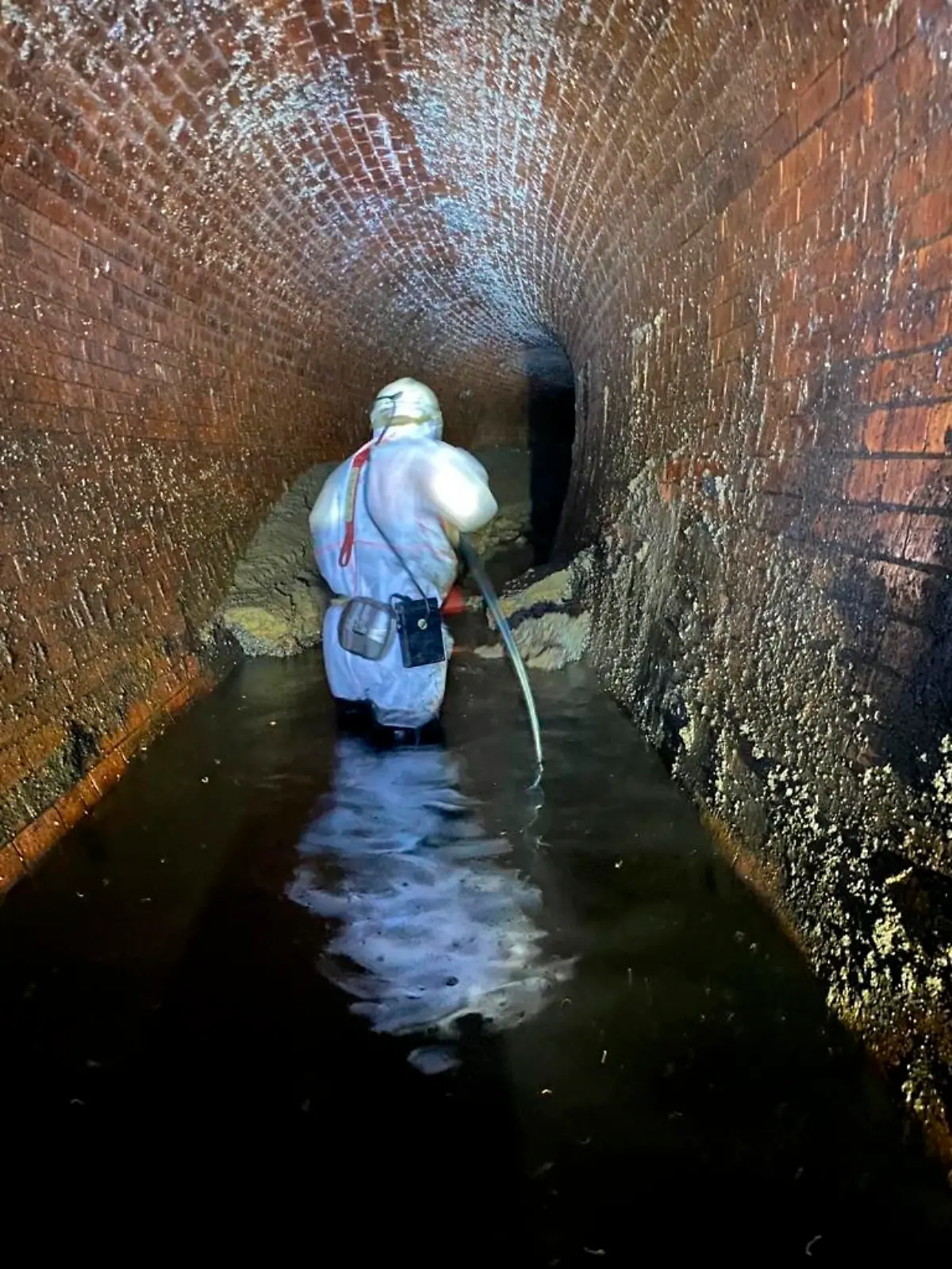 Fatberg in London sewer. Undated handout photo issued by Thames Water of a fatberg, that had the weight of a small bungalow, under Yabsley Street, Canary Wharf, London, during its removal. Issue date: Friday February 19, 2021. Fatbergs are formed when oil, grease and fat poured down drains combine with non-biodegradable items such as wet wipes, nappies and cotton buds. See PA story ENVIRONMENT Fatberg. Photo credit should read: Thames Water/PA Wire NOTE TO EDITORS: This handout photo may only be used in for editorial reporting purposes for the contemporaneous illustration of events, things or the people in the image or facts mentioned in the caption. Reuse of the picture may require further permission from the copyright holder. URN:58165834