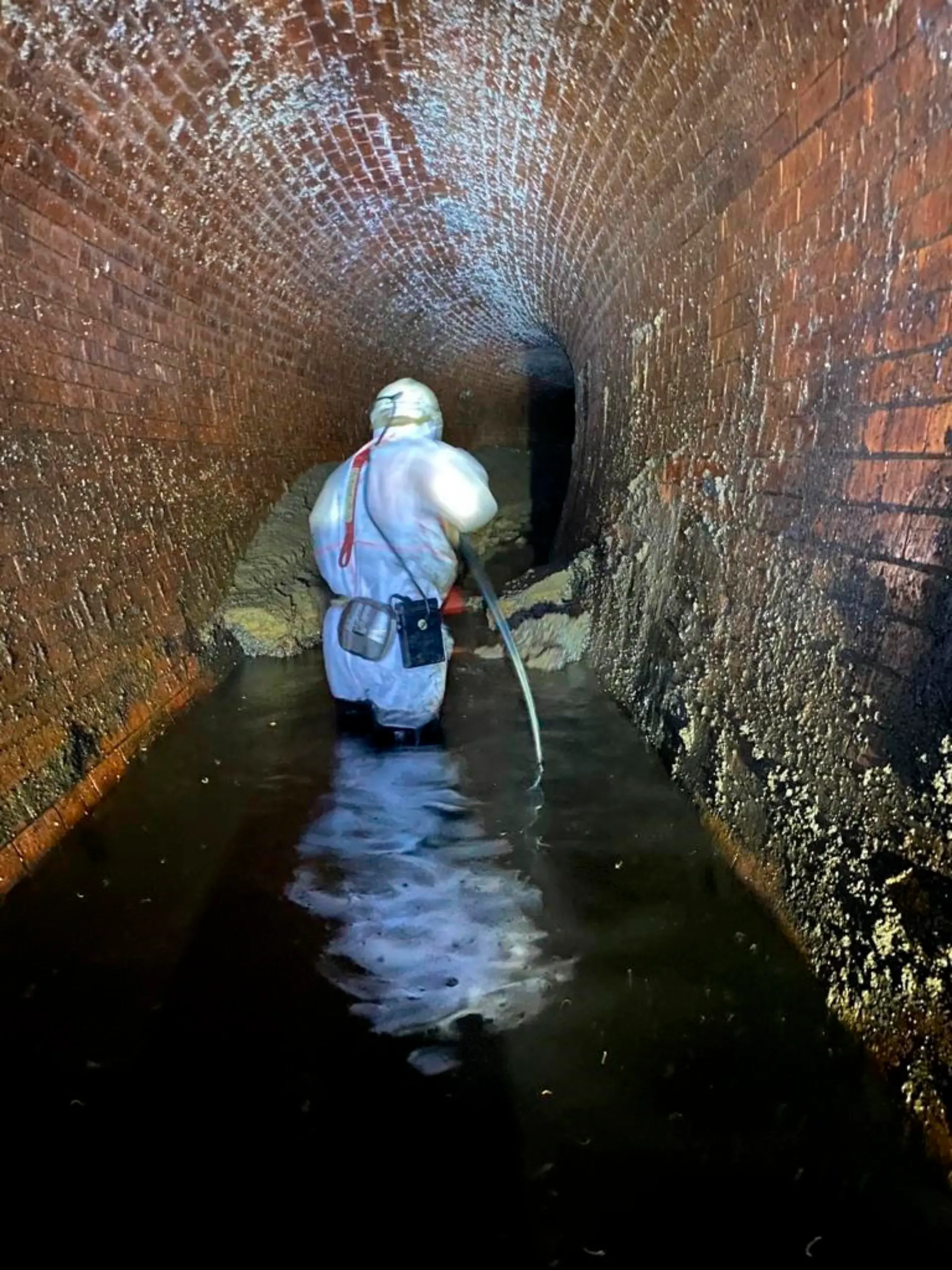 Fatberg in London sewer. Undated handout photo issued by Thames Water of a fatberg, that had the weight of a small bungalow, under Yabsley Street, Canary Wharf, London, during its removal. Issue date: Friday February 19, 2021. Fatbergs are formed when oil, grease and fat poured down drains combine with non-biodegradable items such as wet wipes, nappies and cotton buds. See PA story ENVIRONMENT Fatberg. Photo credit should read: Thames Water/PA Wire NOTE TO EDITORS: This handout photo may only be used in for editorial reporting purposes for the contemporaneous illustration of events, things or the people in the image or facts mentioned in the caption. Reuse of the picture may require further permission from the copyright holder. URN:58165834